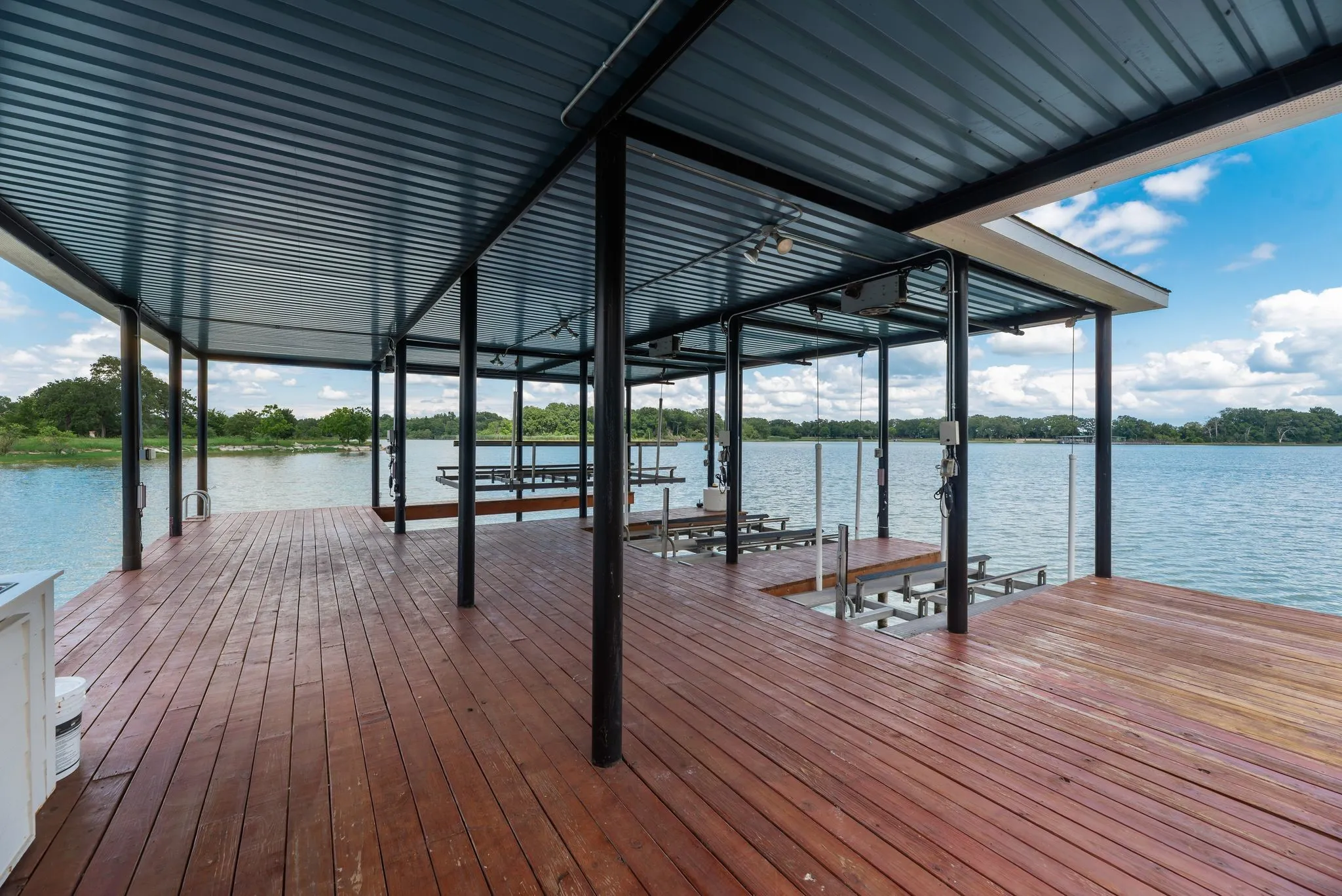 Covered boathouse deck with wide-open Richland Chambers Lake views.
