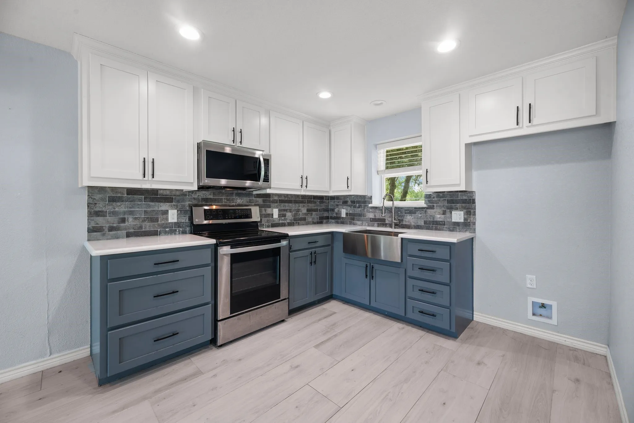 Efficiency apartment kitchen ideal for guests, rental use, or extended stays.