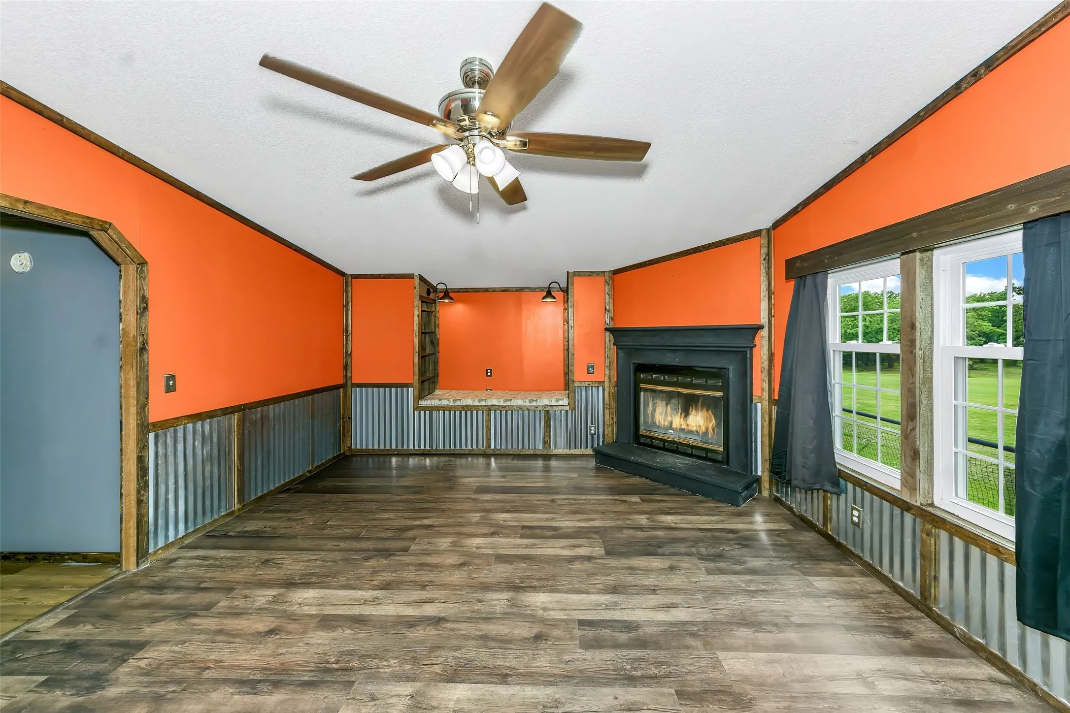 Living space featuring wood-finish flooring-AI removal