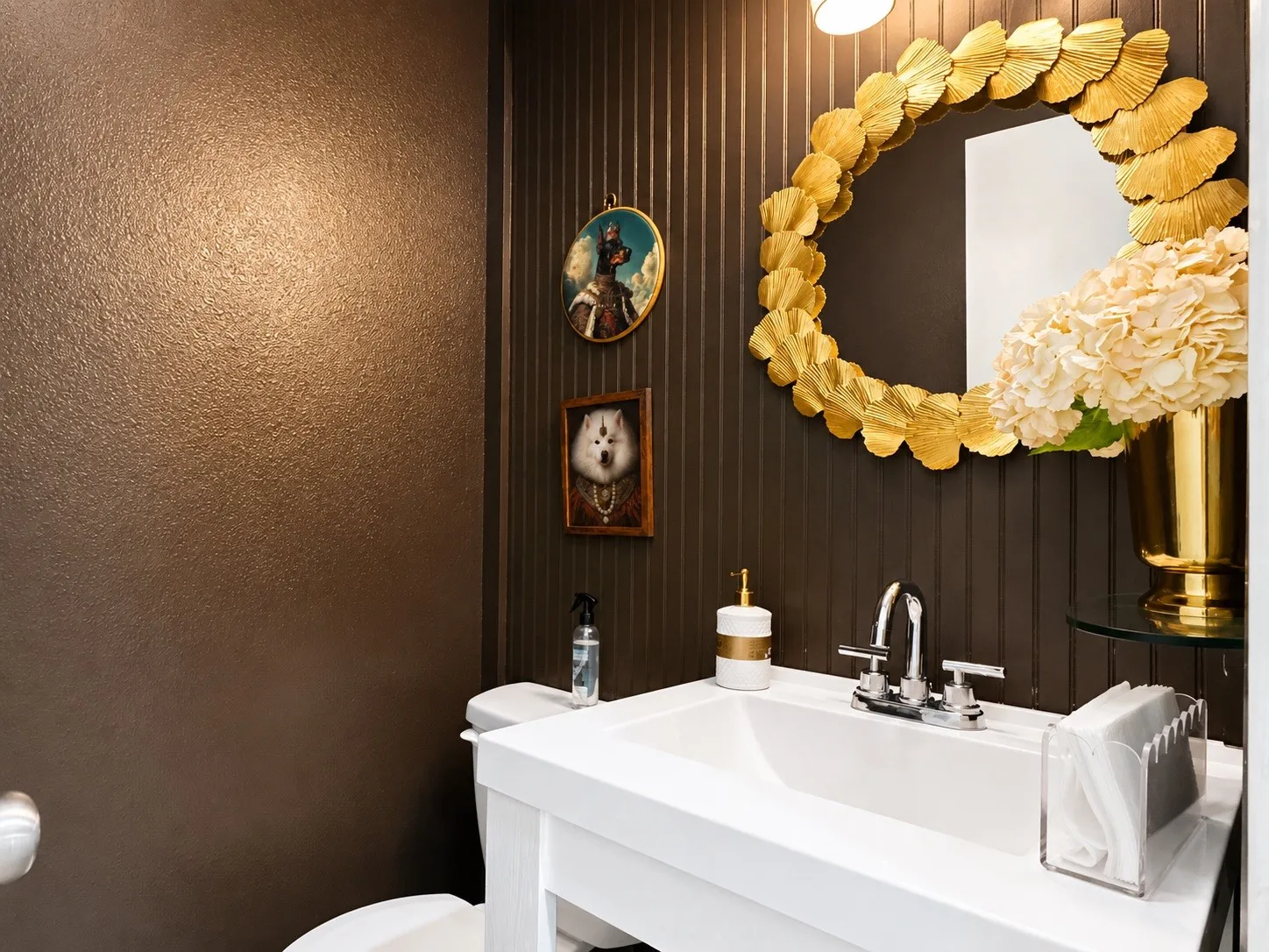 White vanity with integrated sink and chrome faucet