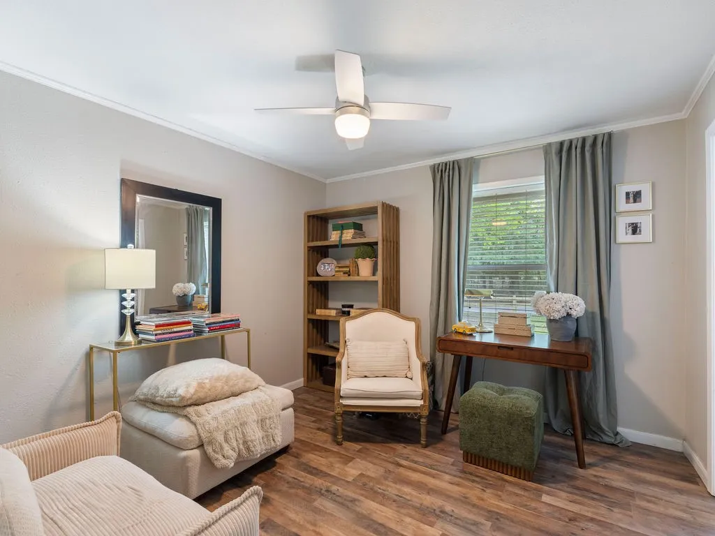 Wood-finish flooring complementing light-toned walls