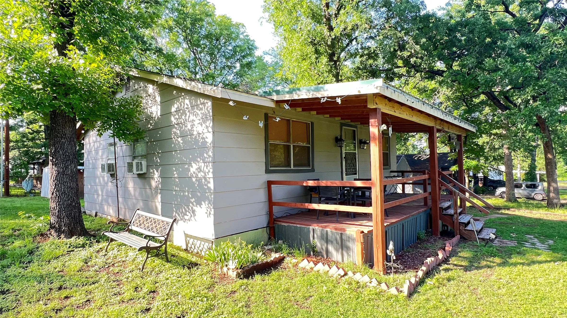 Side and front porch view of home.