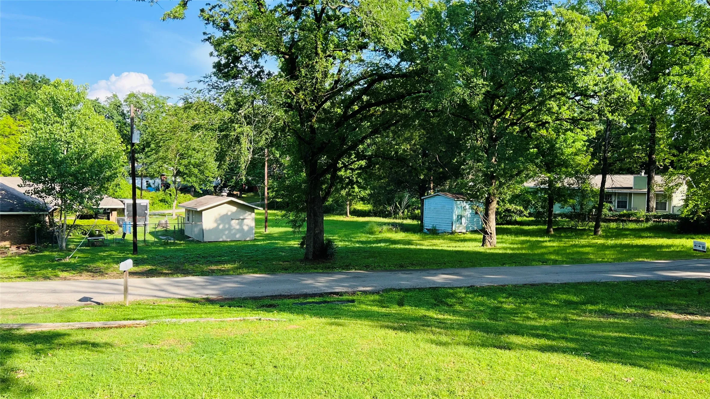View across Hilltop Dr from front yard.