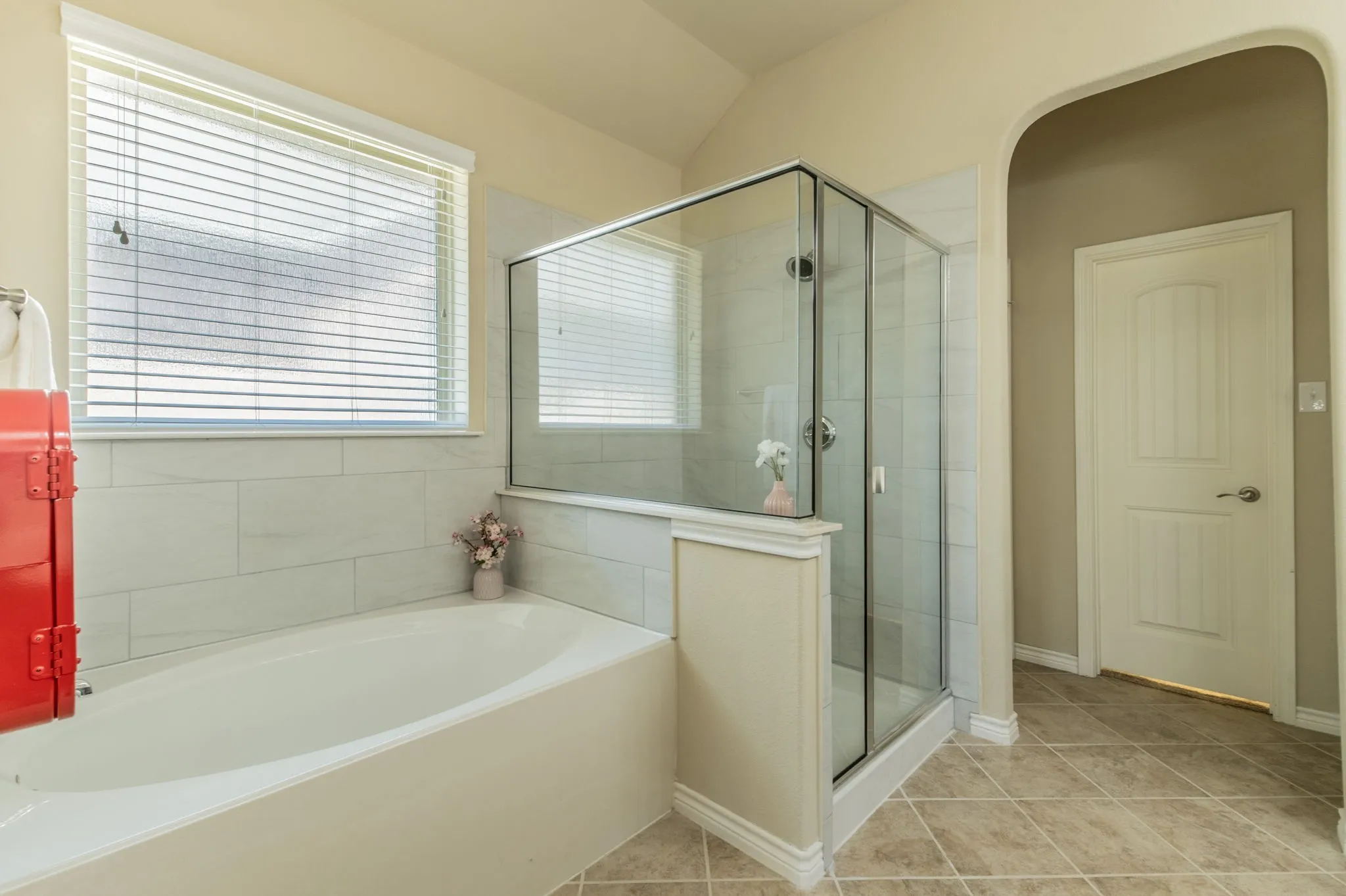 Primary bathroom with soaking tub and oversized shower