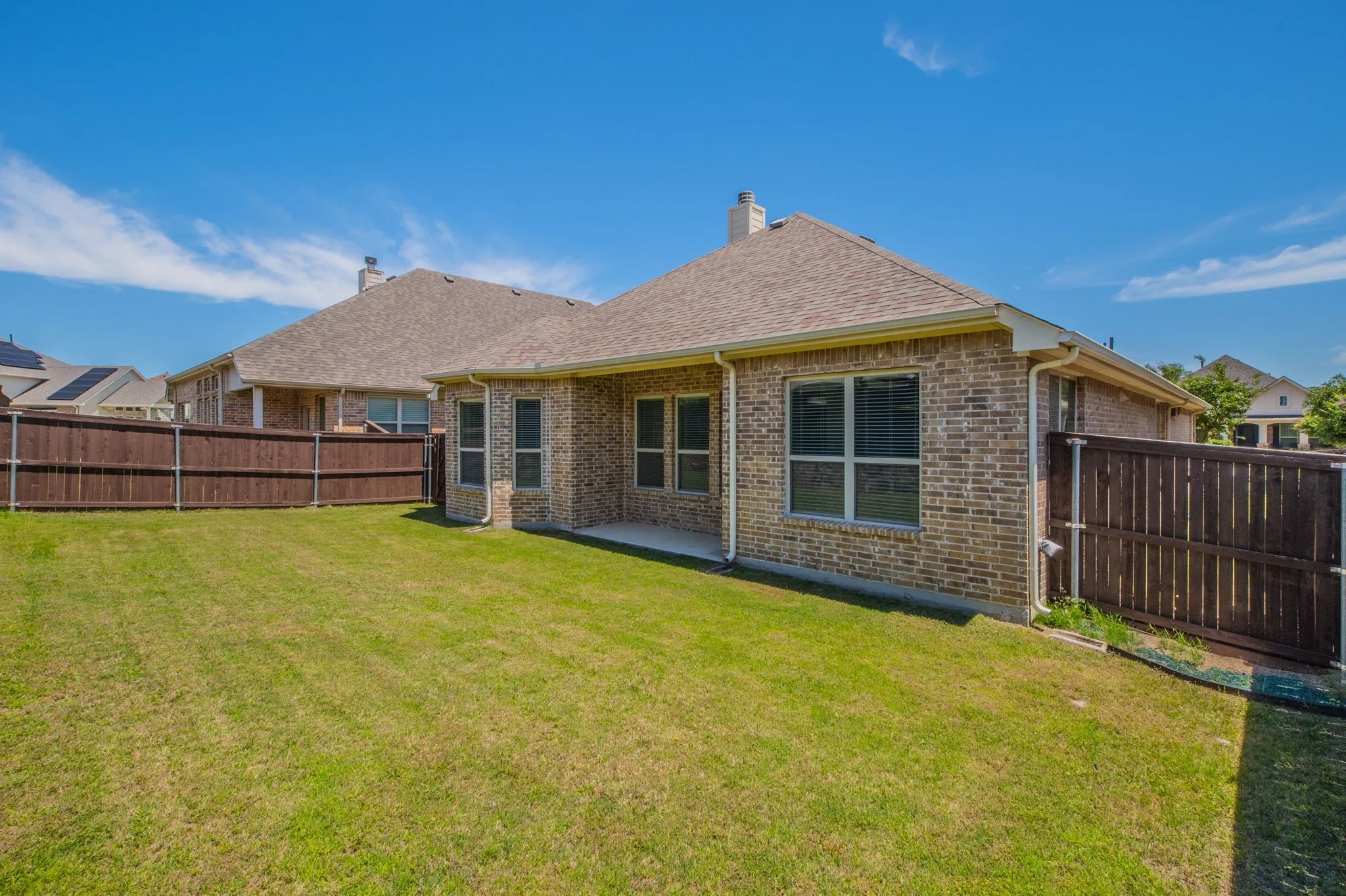 Spacious rear yard with western exposure
