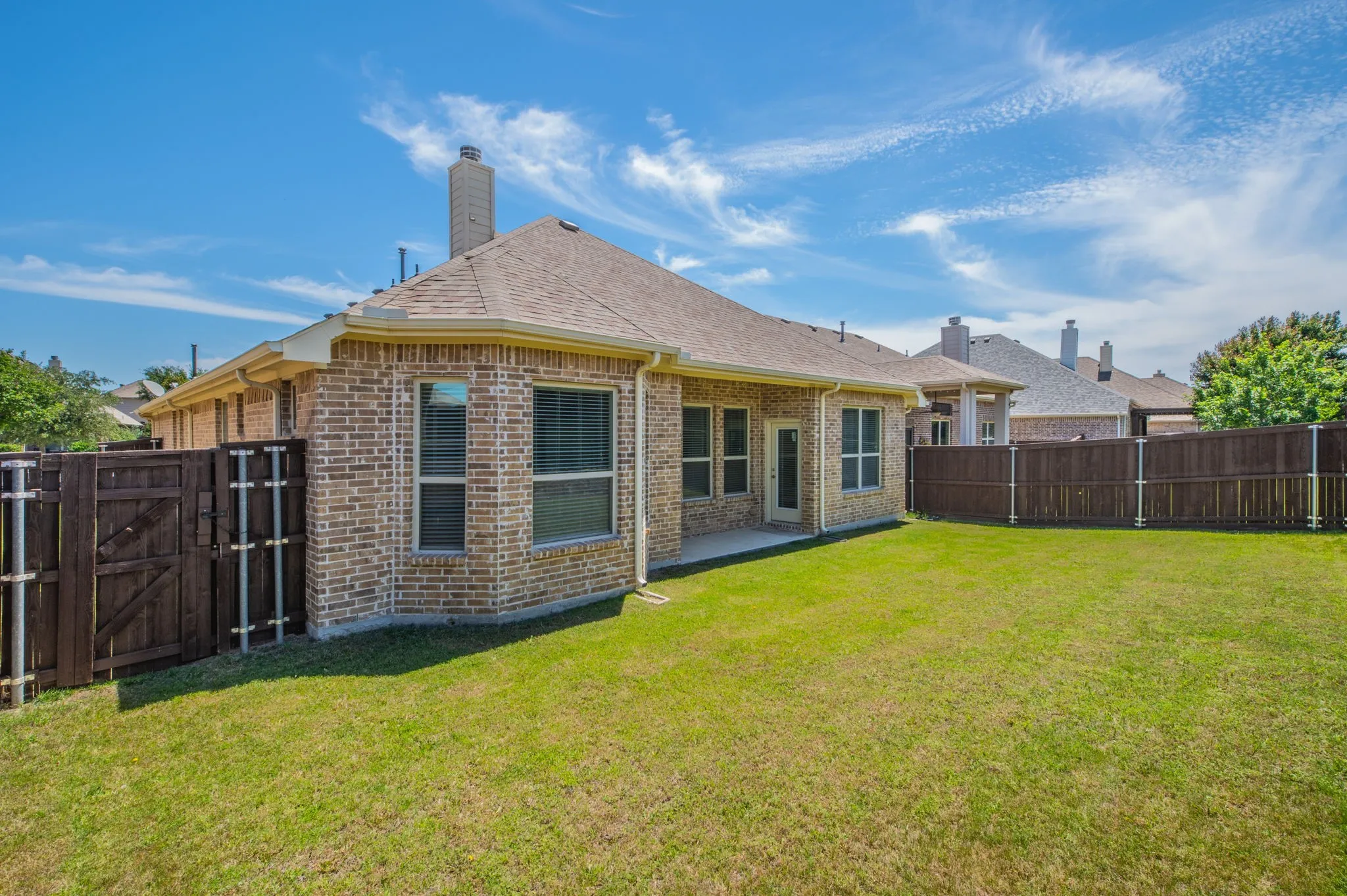 Spacious rear yard with western exposure