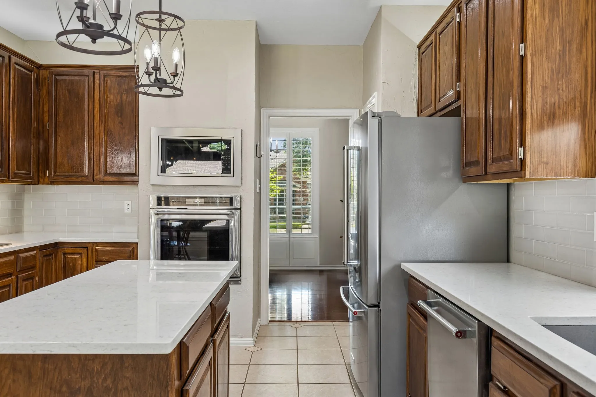 The kitchen has direct access to both dining areas - perfect for entertaining.
