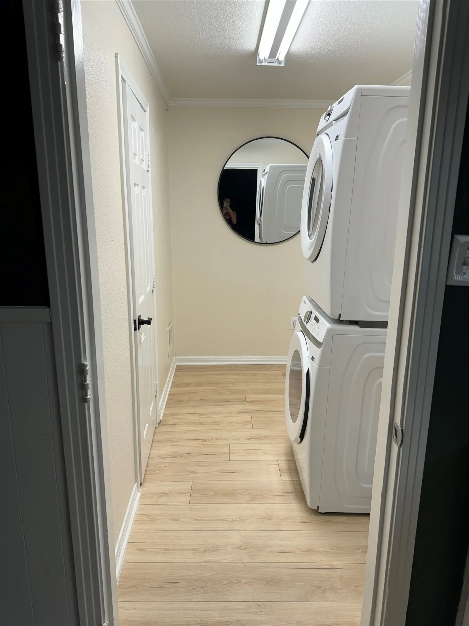 Wood-finish flooring throughout the space