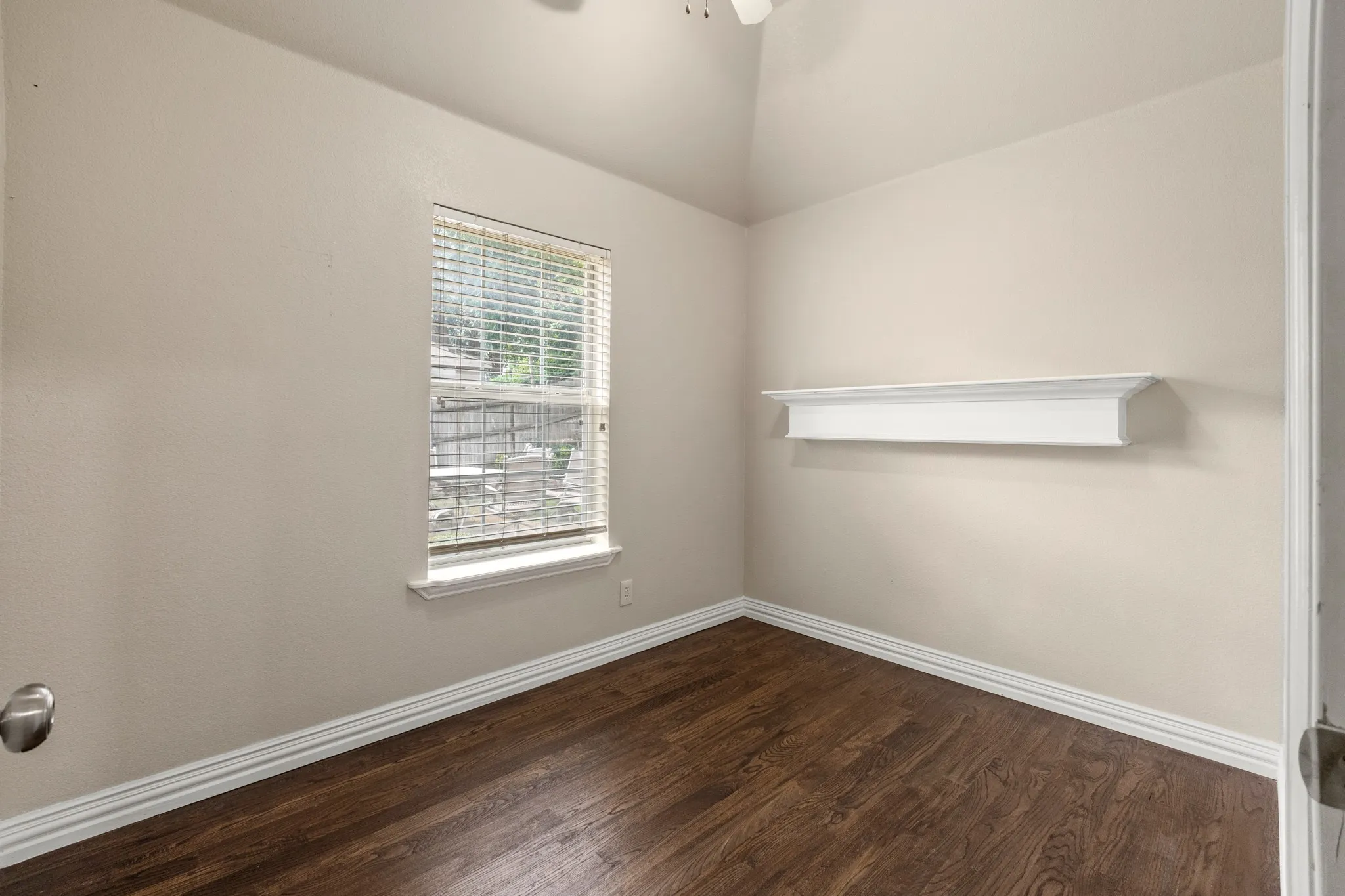 Empty room with wood-type flooring