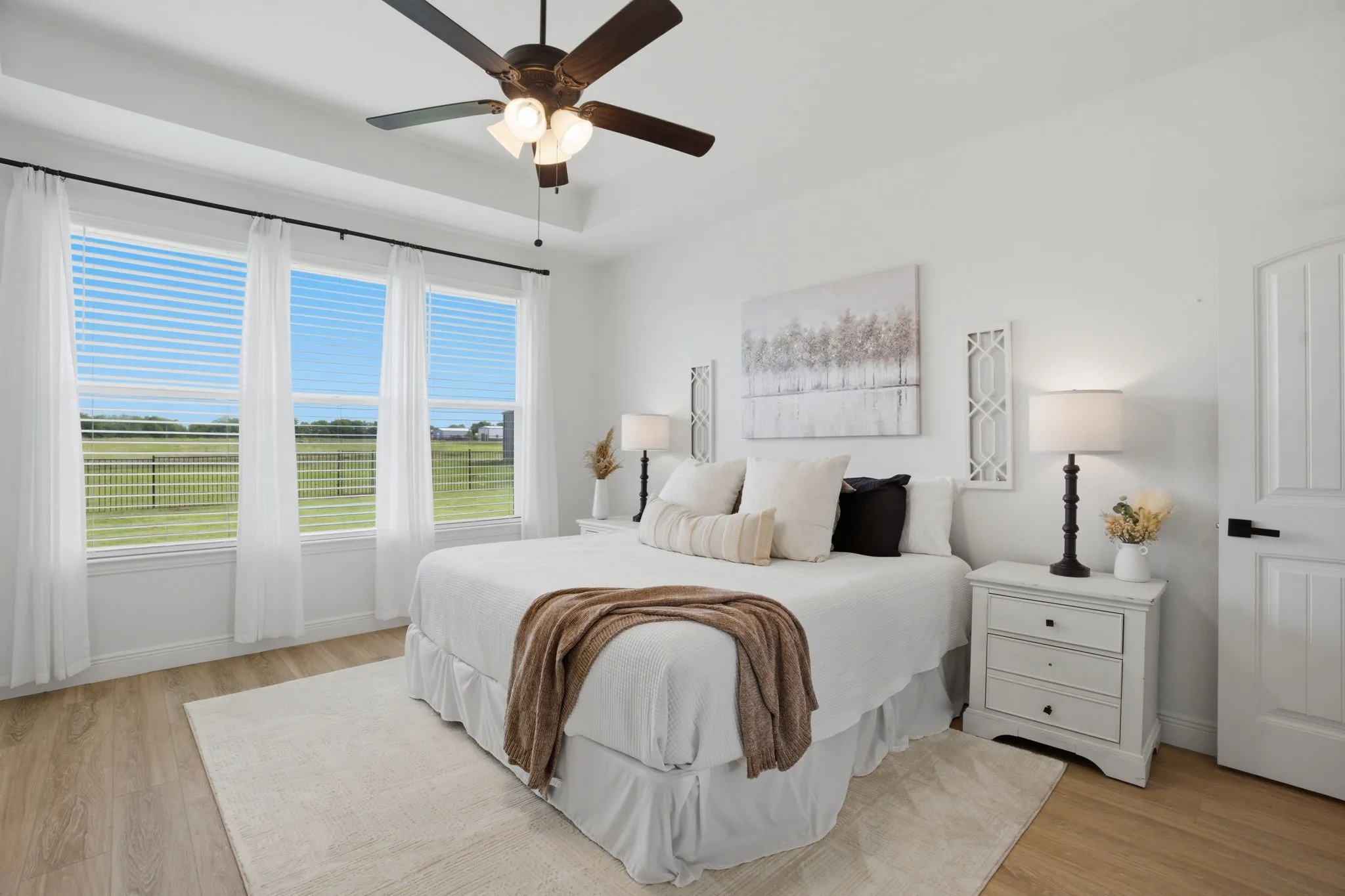 The primary bedroom presents a serene & luxurious retreat, separated from the secondary bedrooms.