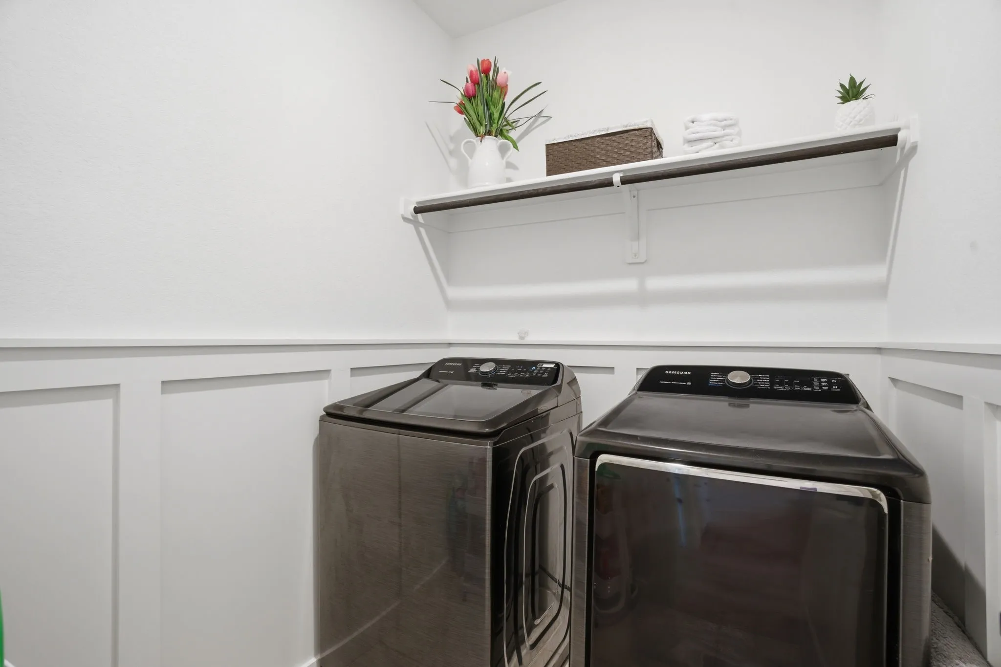 Separate utility room also has board & batten walls.