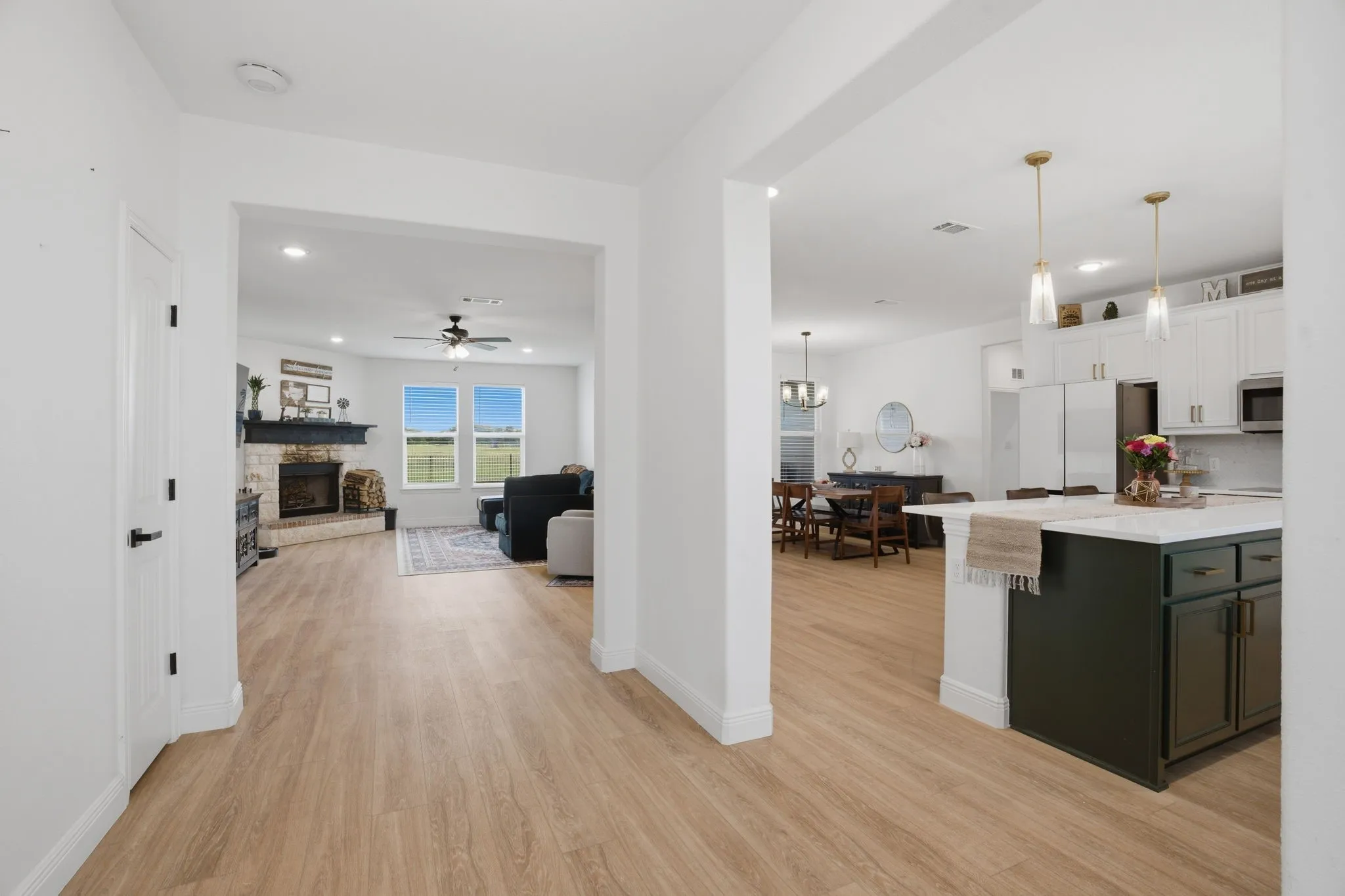 From the moment you enter, you'll see the open floorplan + vast luxury vinyl plank flooring throughout the interior. So easy to care for too.