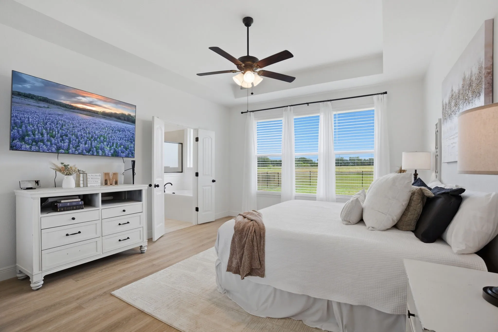 Vista views from the secluded primary bedroom. Large enough to accommodate a king-sized bed, plenty of room for a sitting area too.