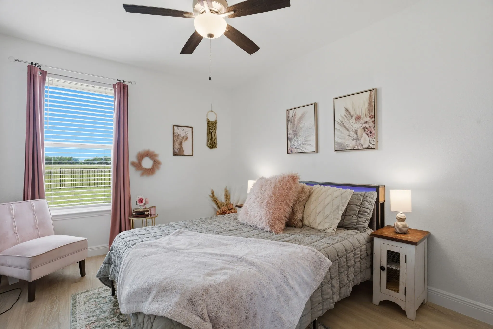 Bedroom 2 faces the backyard. All bedrooms have the LVP flooring.