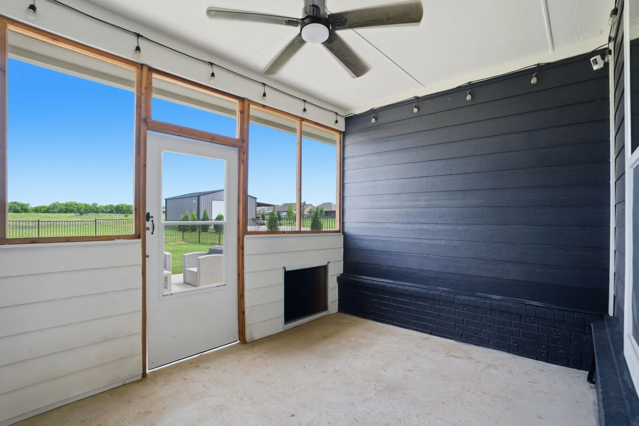 For your beloved furry friends...this cute enclosed porch is ready for them!