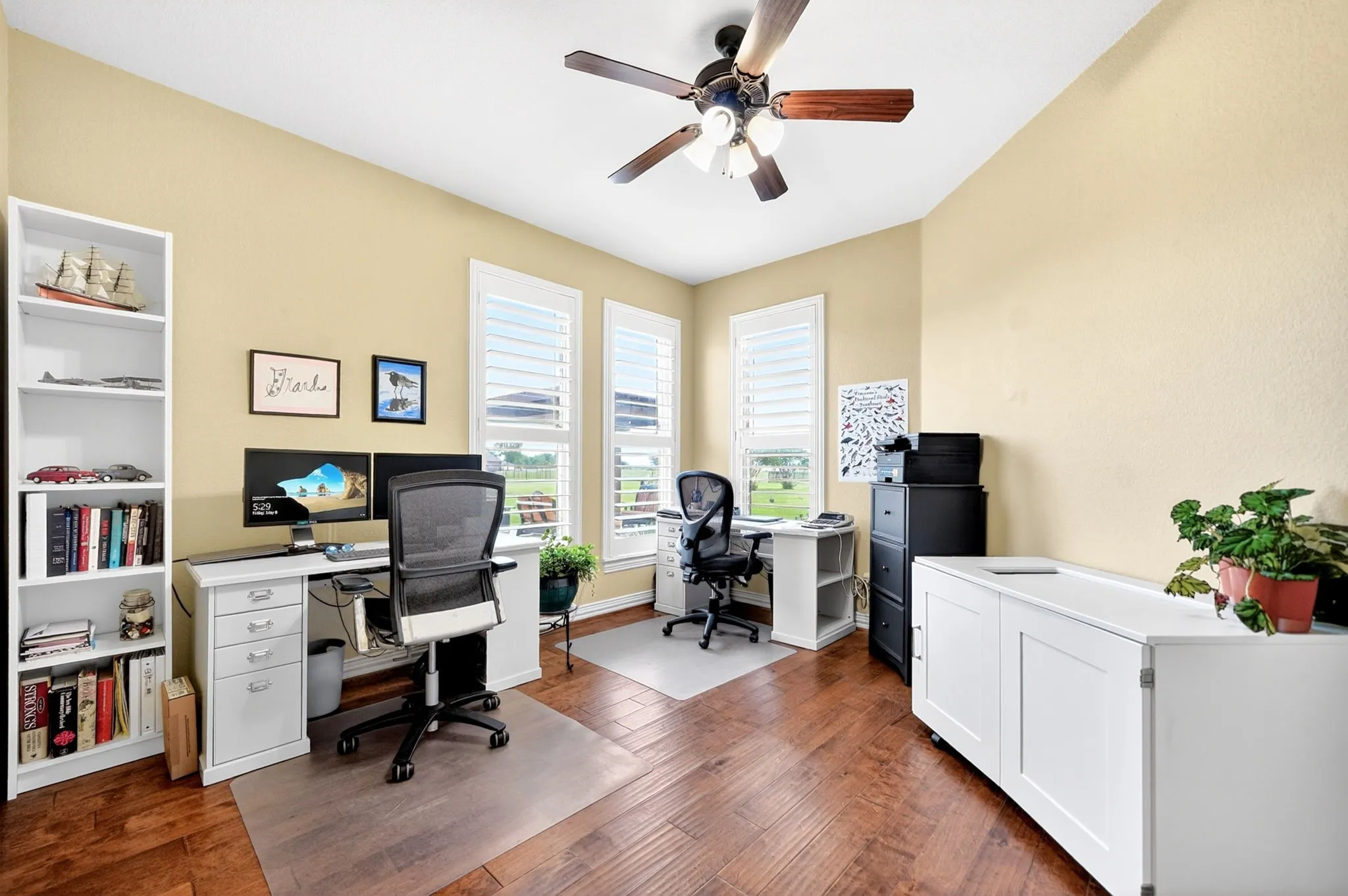 Room featuring warm-toned walls and wood-finish flooring