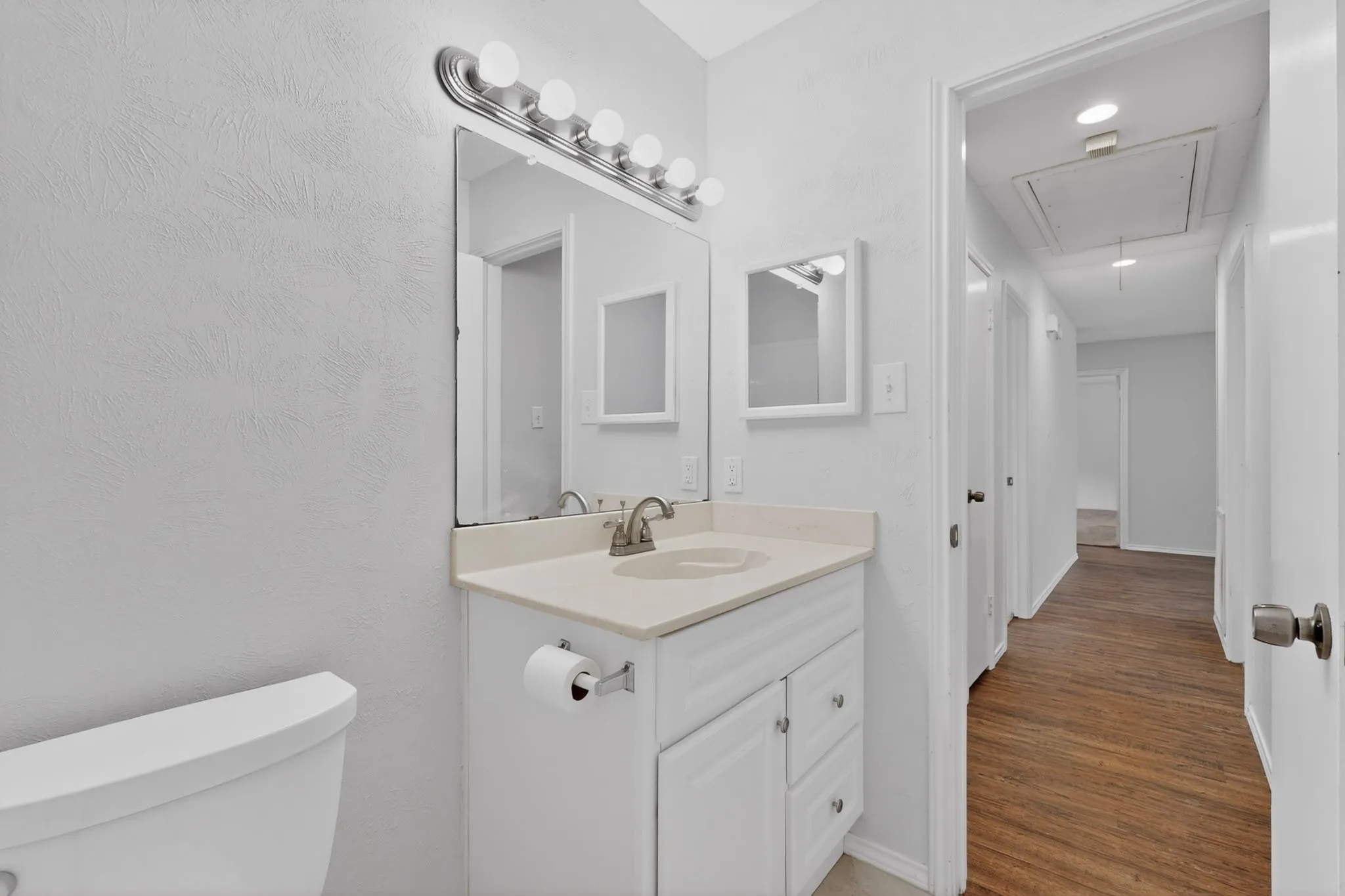Hall bathrooom has a tub.