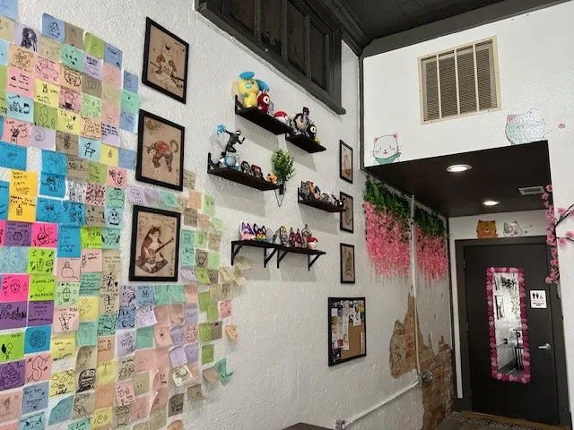 115 E Wall Street unit with white textured wall with exposed brick details