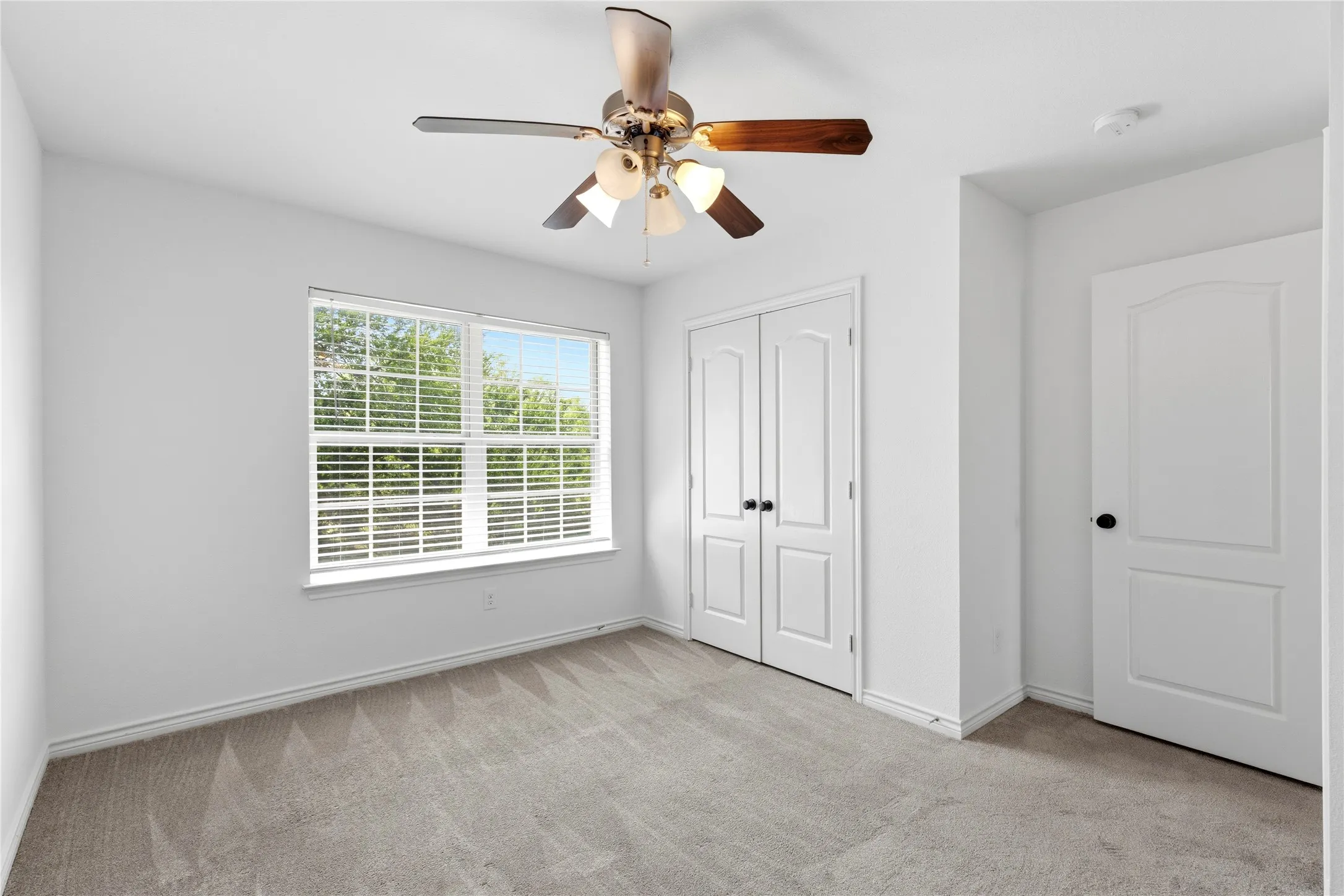 White-painted interior with carpet flooring