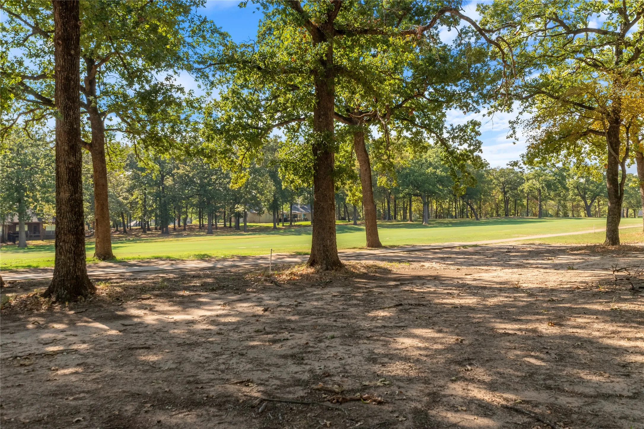 Beautiful treed lot on award winning Pinnacle Club golf course.