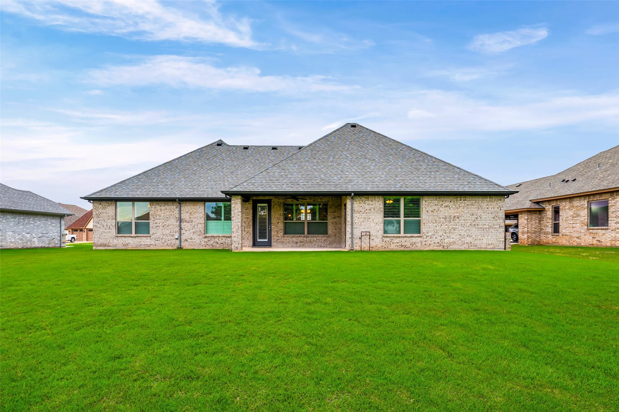 Expansive green lawn providing abundant outdoor space