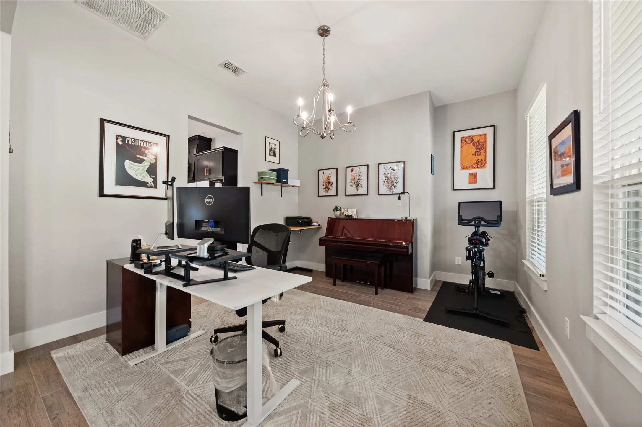 Currently staged as an office, it is a dining room