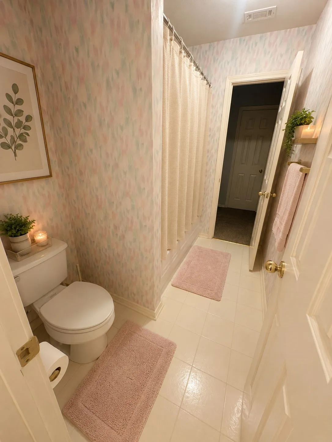 Full bathroom featuring a white toilet, tile flooring, and a shower with a curtain rod