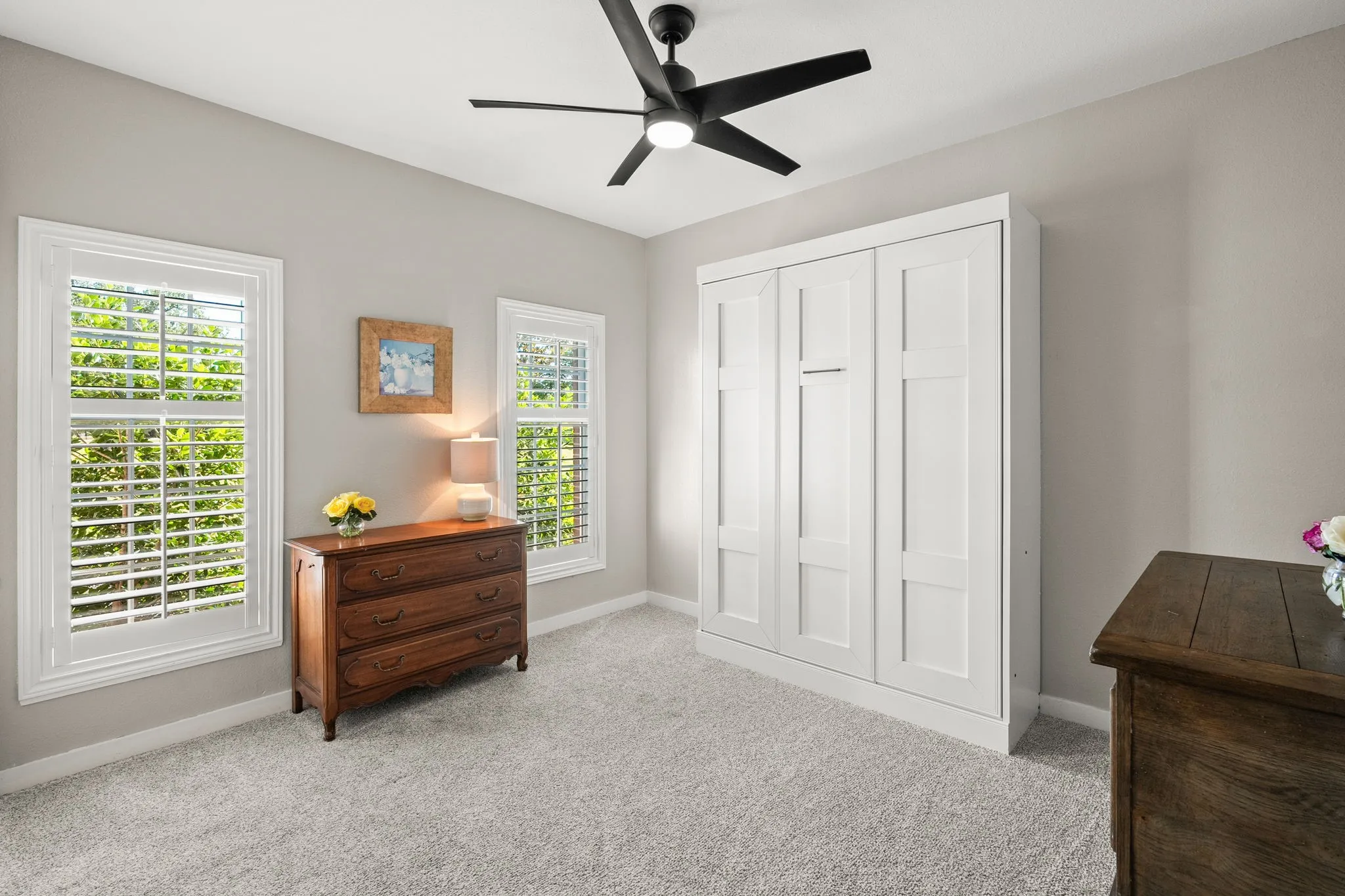 Downstair Guest Room with Murphy Bed and access to full bath.