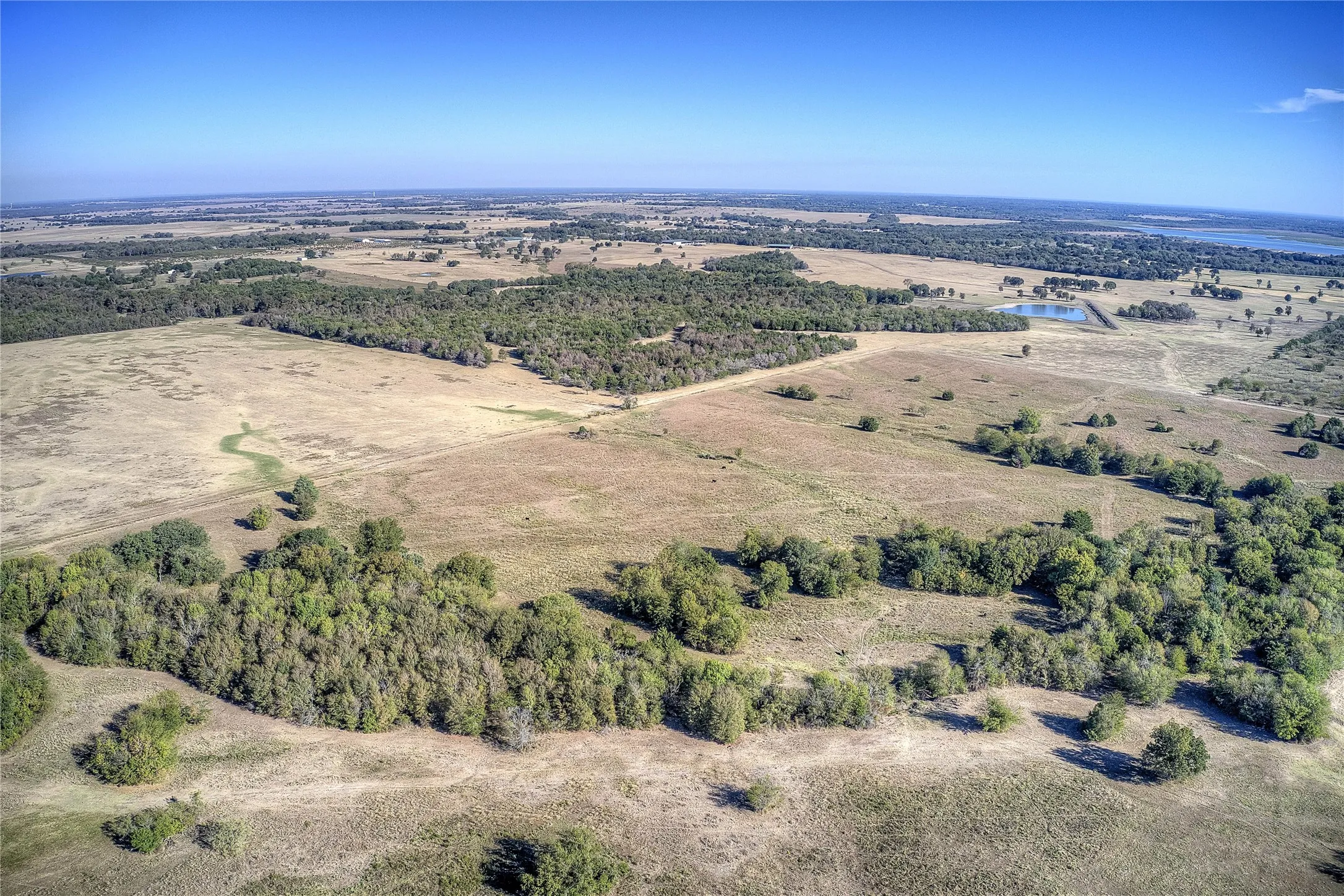Aerial view with a rural view and a water view