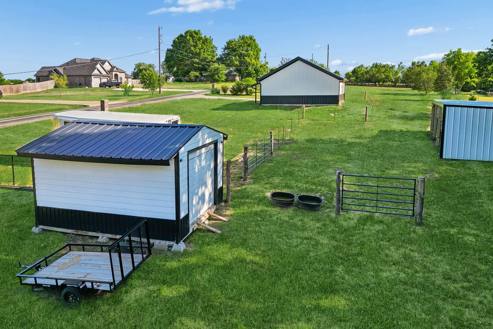 Shed with garage door, possibly a one car garage