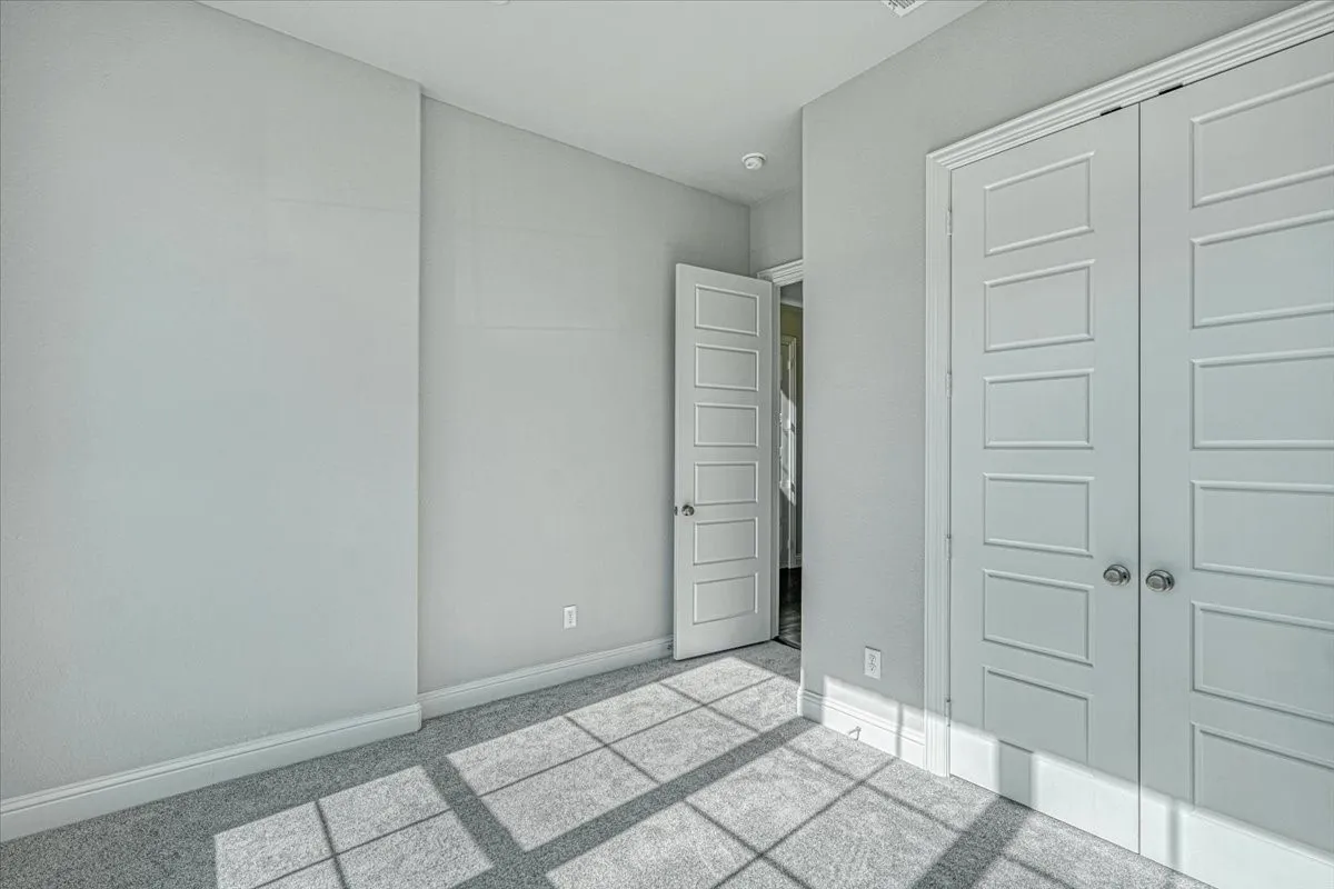 Unfurnished bedroom featuring a closet