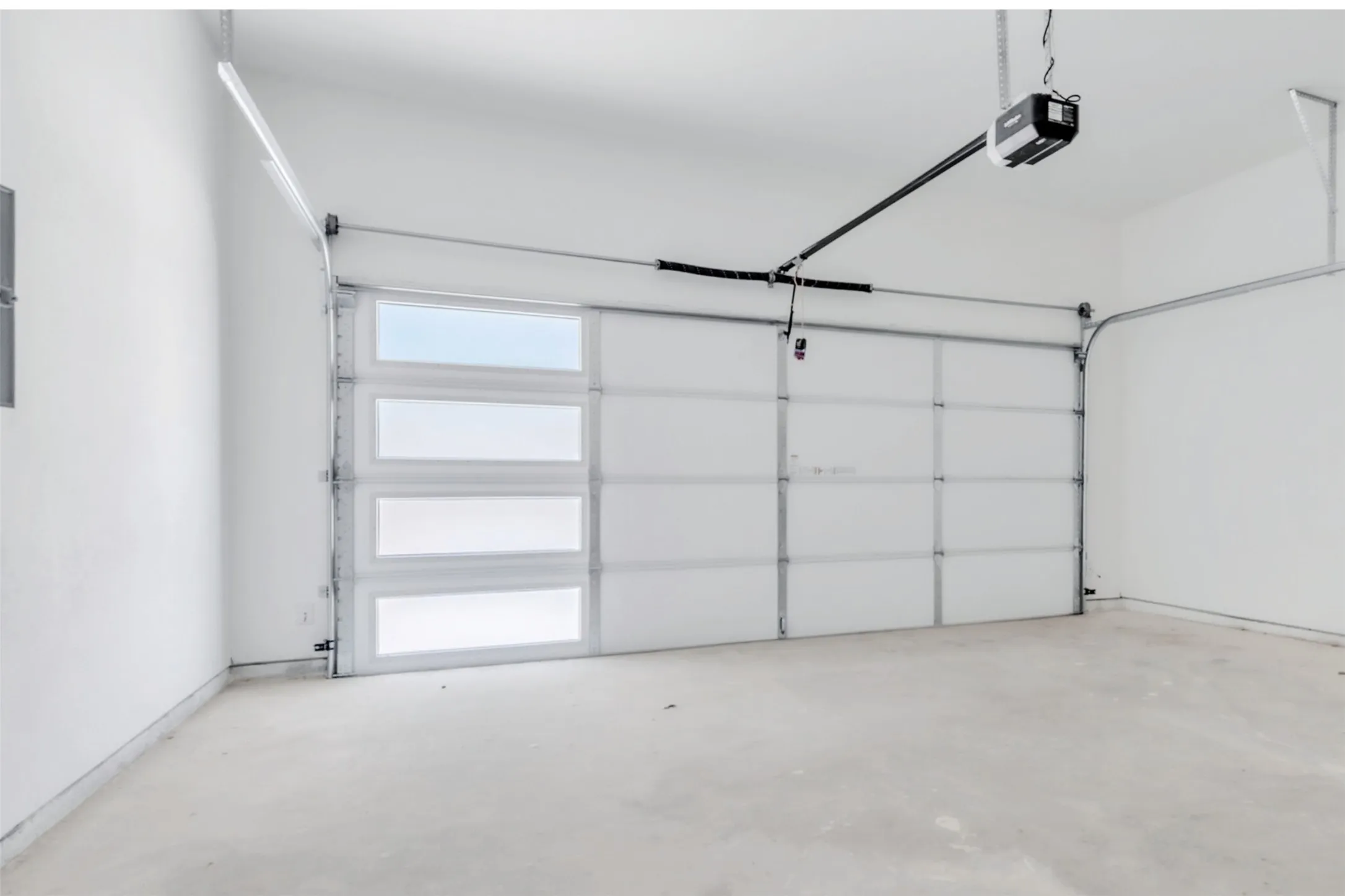 Modern, finished out garage with opener