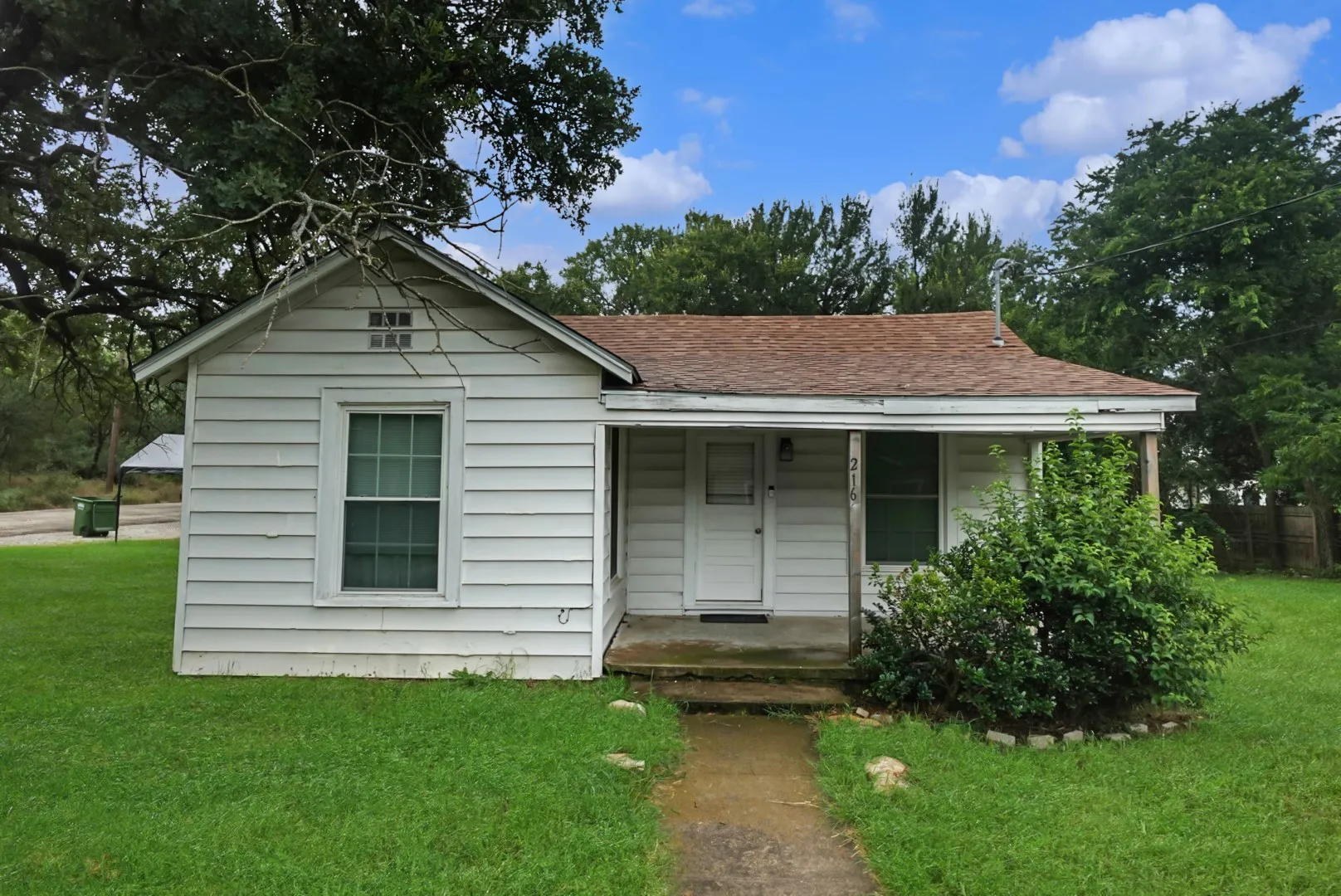 Single Family Residence For Sale in Palo Pinto County , 216 19th Street, Mineral Wells, Texas 76067, 2 Bedrooms, 1 Bathroom, Garage spaces, 1,226 Sqft, built in 1935, Price $155,000, mls#21269043, Real Estate Agent in Mineral Wells, Homes For Sale in Palo Pinto county, Homes For Sale in Mineral Wells, Realtor in Mineral Wells Texas, Real Estate Brokerage Independent Realty Texas, Luminita Cordes Realtor