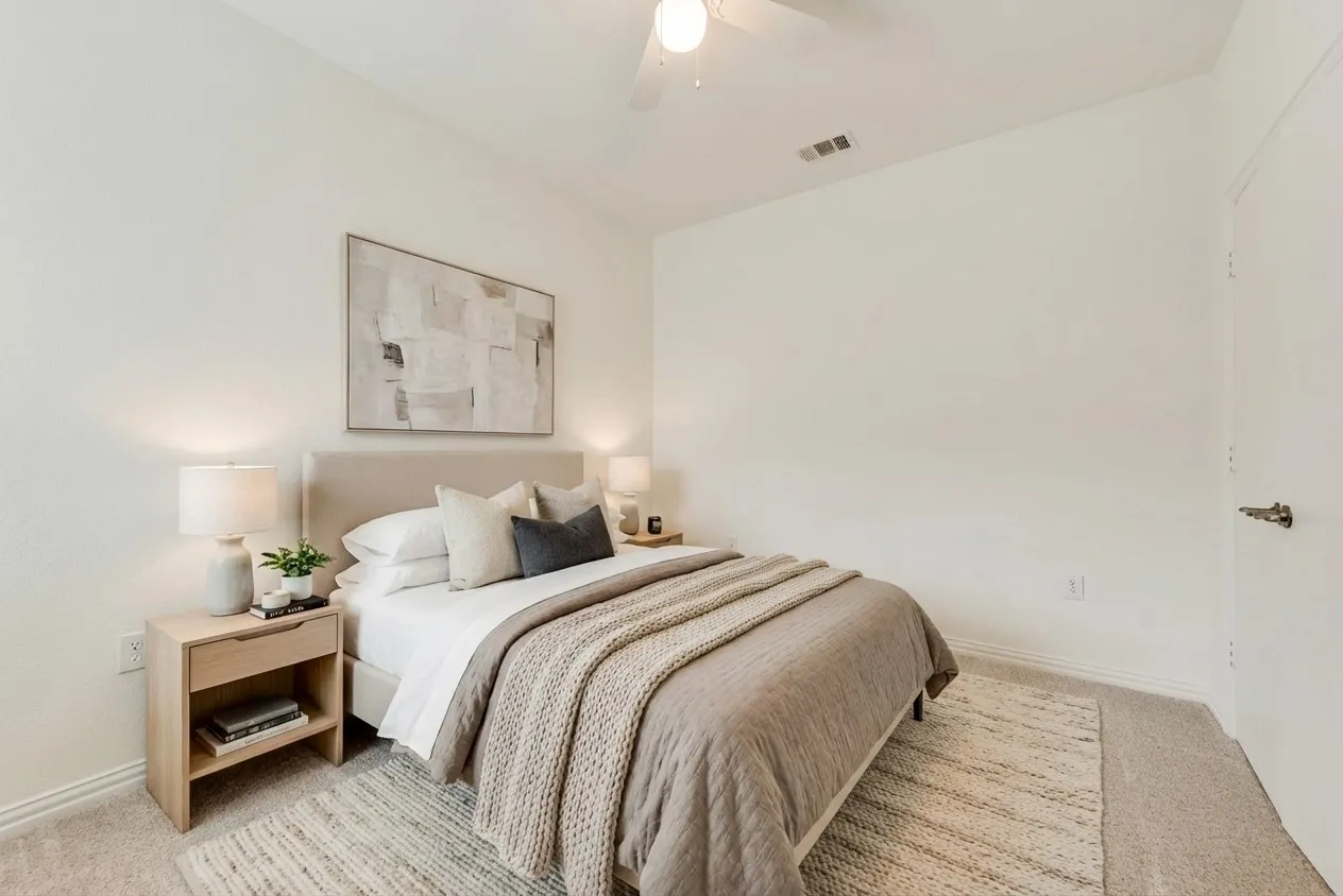 Neutral wall tones with a ceiling fan overhead