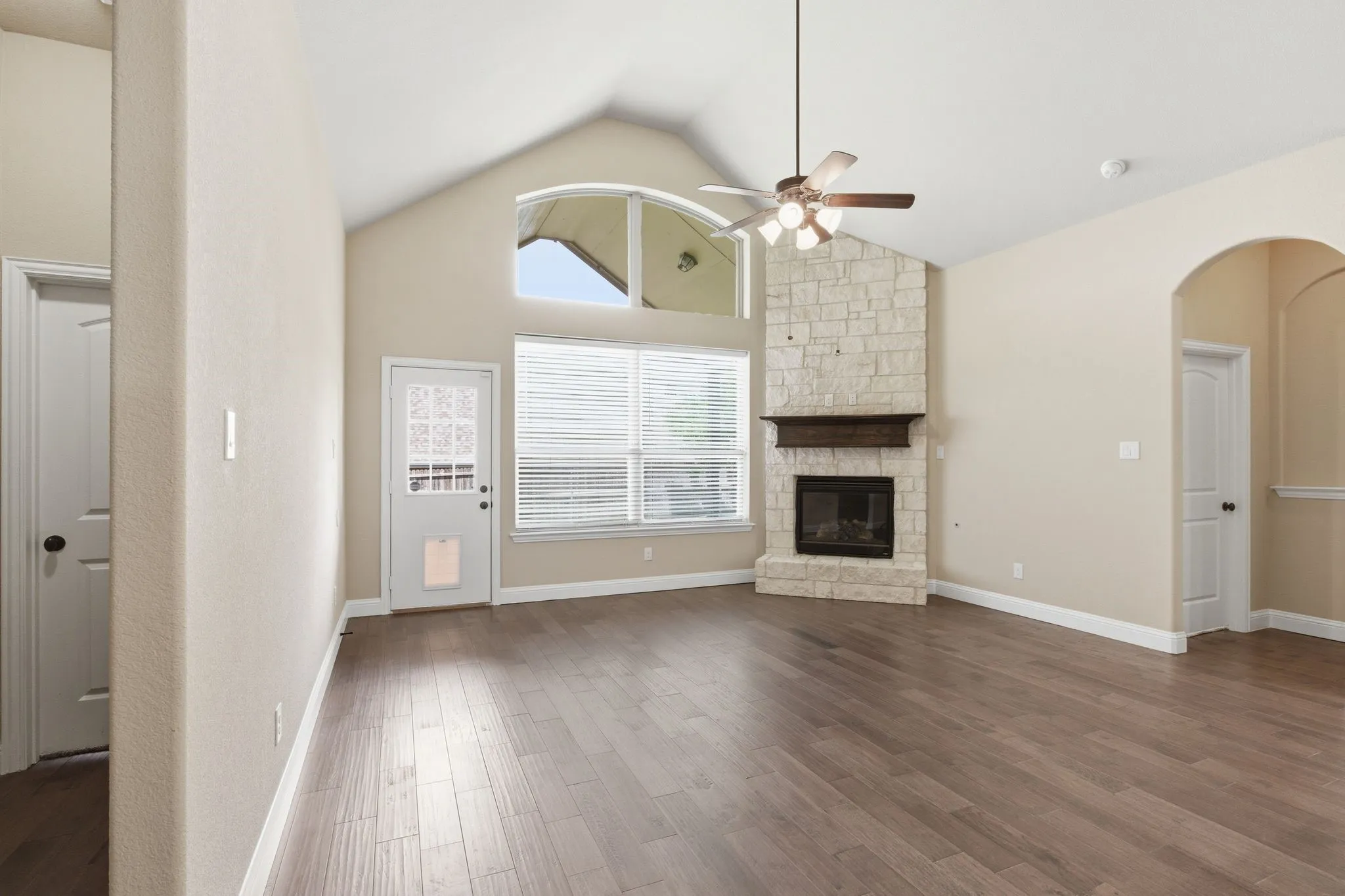 Open floor plan, with kitchen overlooking the living room.