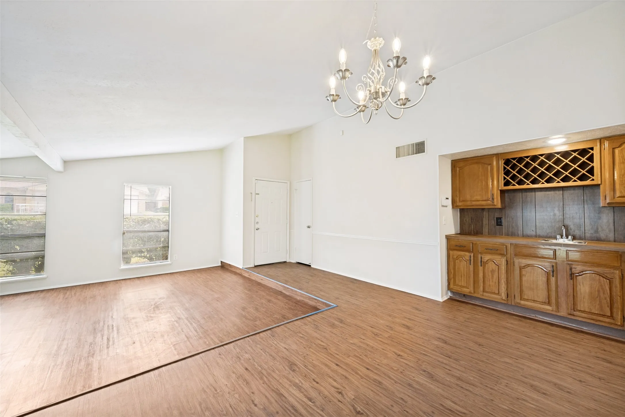 The living and dining area have been virtually staged for your ideas.