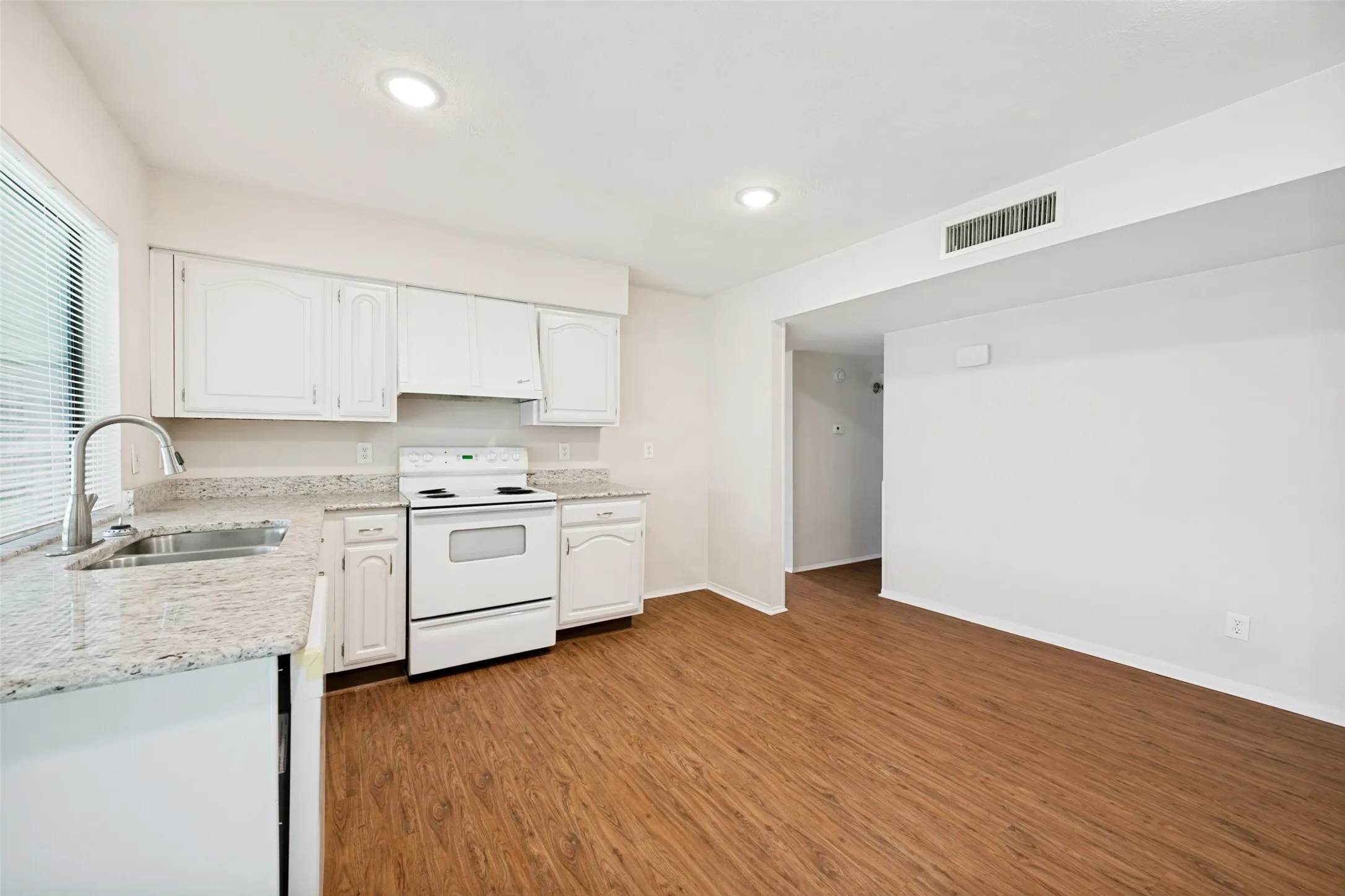 The large eat-in kitchen.