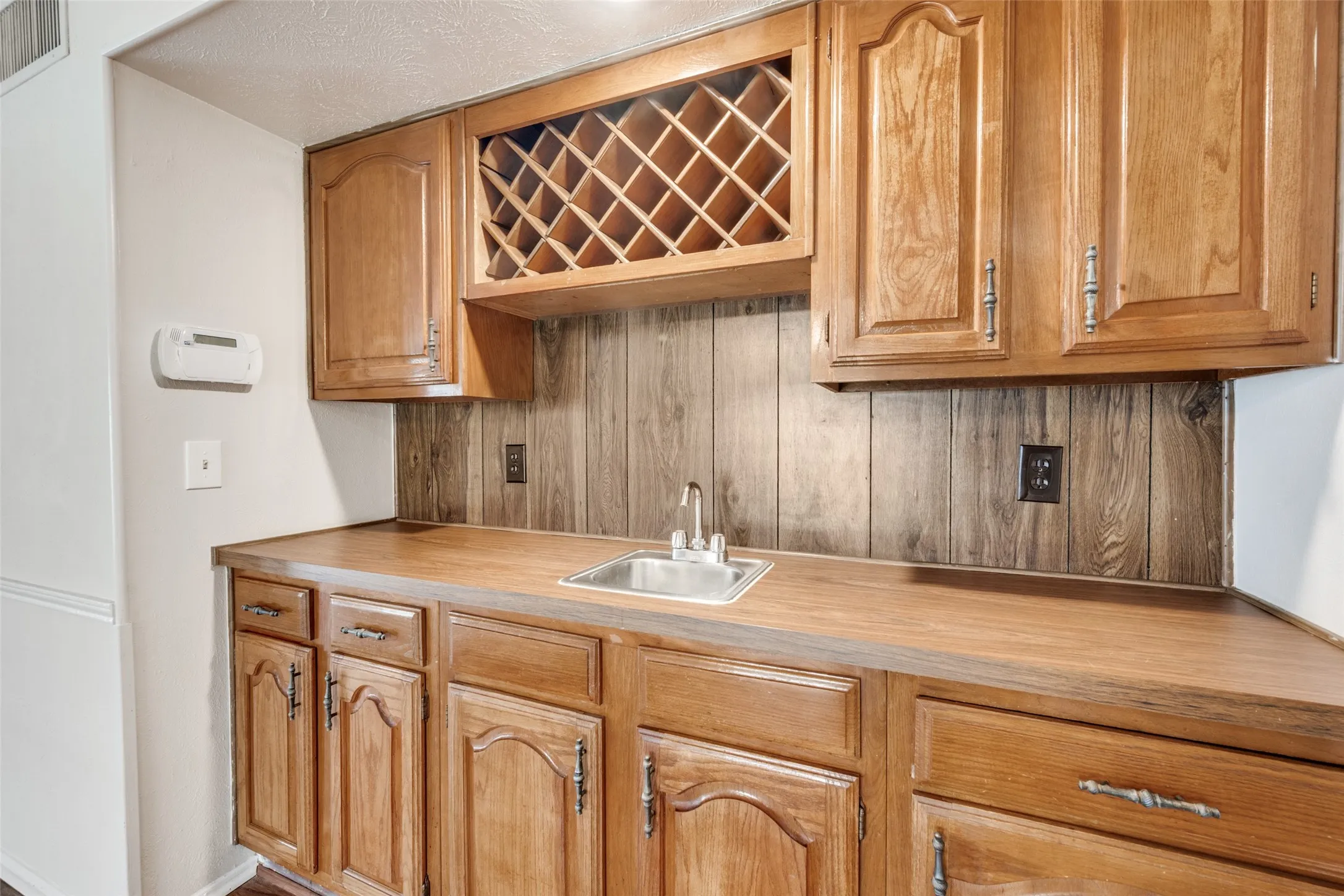 These cabinets with sink provide a great serving area for entertaining.