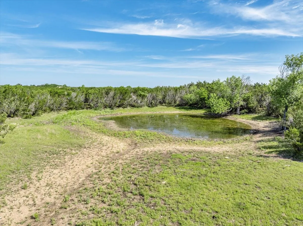 A private tank on your own 20 acres makes this Glen Rose property even more special. Whether you envision watering livestock, or simply enjoying the serene view, this is Texas land living at its finest