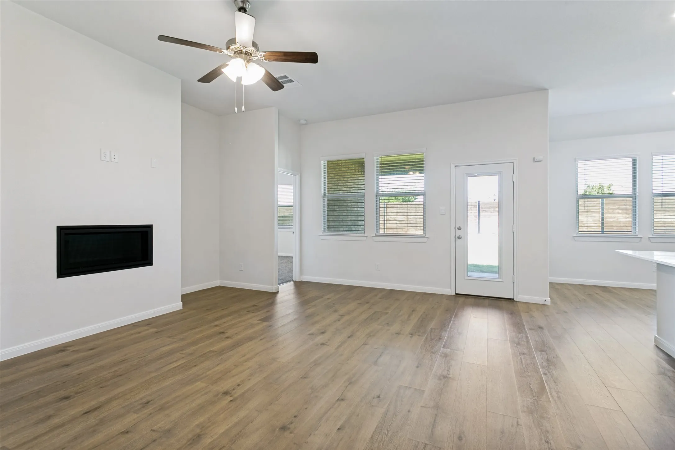 Ceiling Fan and Modern Fireplace