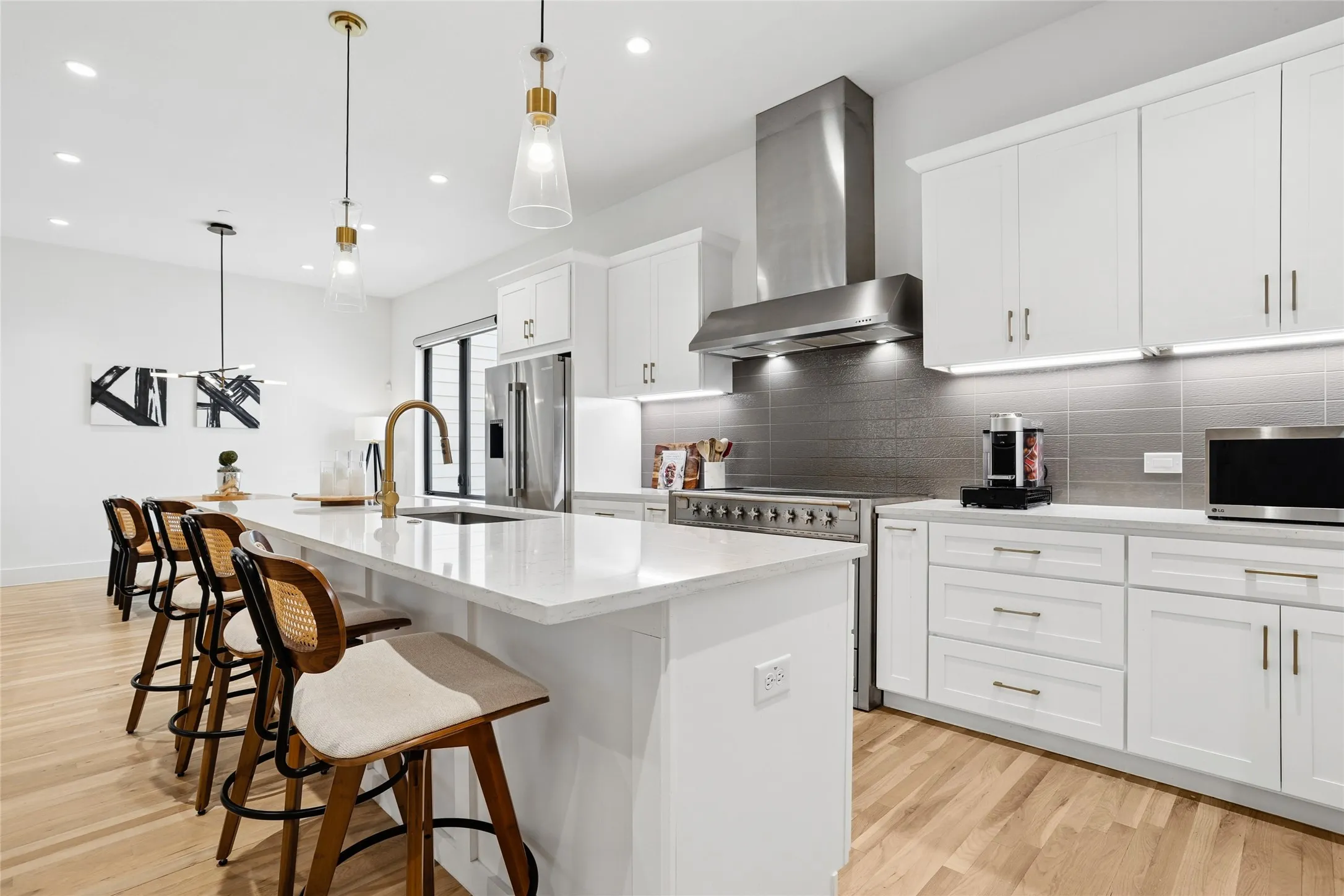 Premium Bosch appliances, a professional-grade AGA Elise series range, and a spacious quartz island