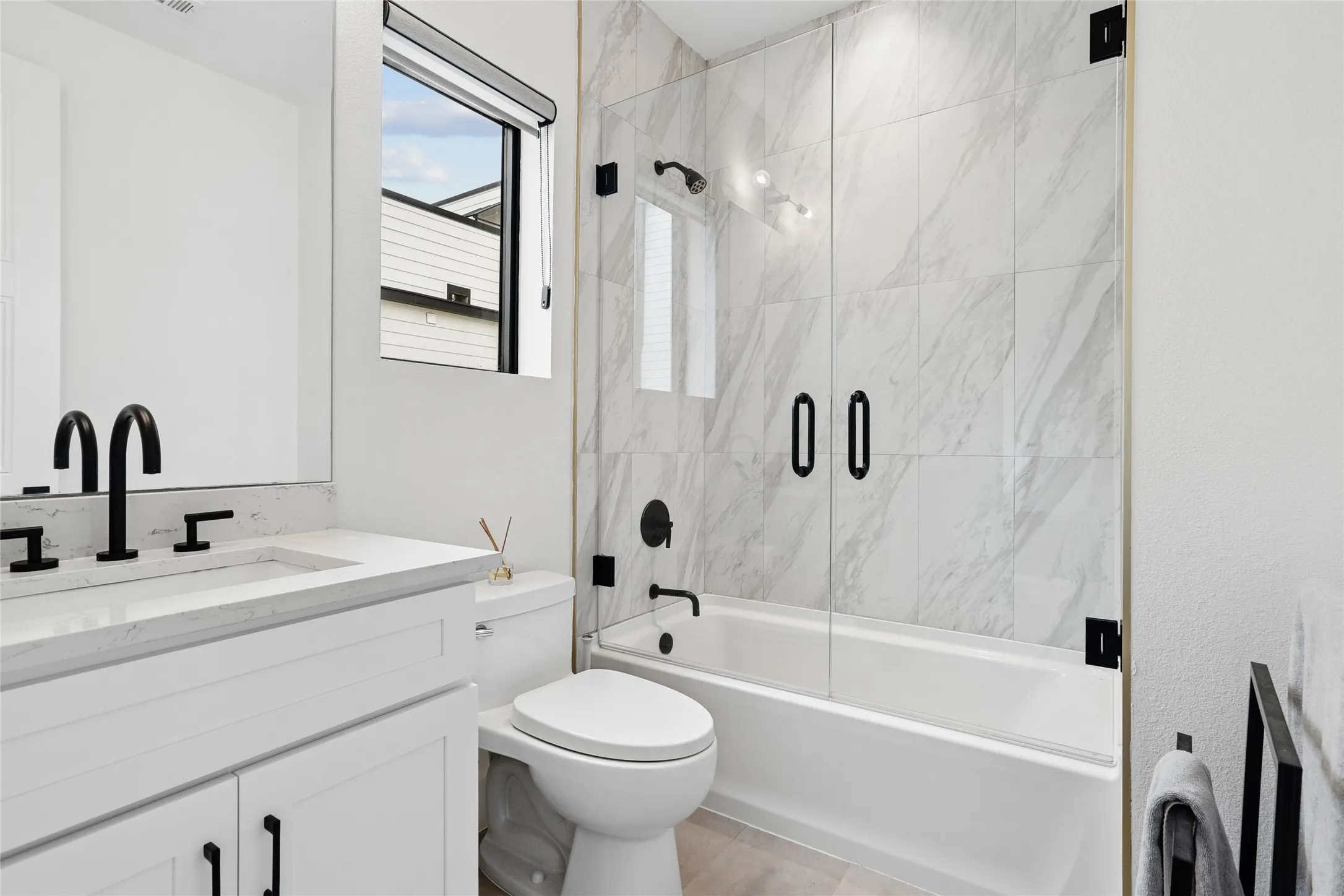 2nd ensuite bath with glass enclosure