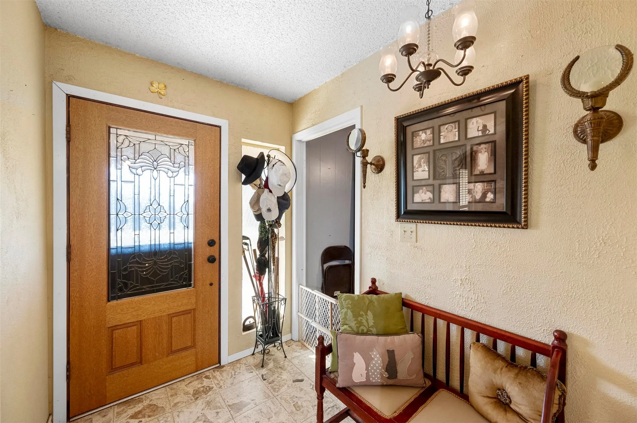 Wood-finish entry door with decorative glass paneling