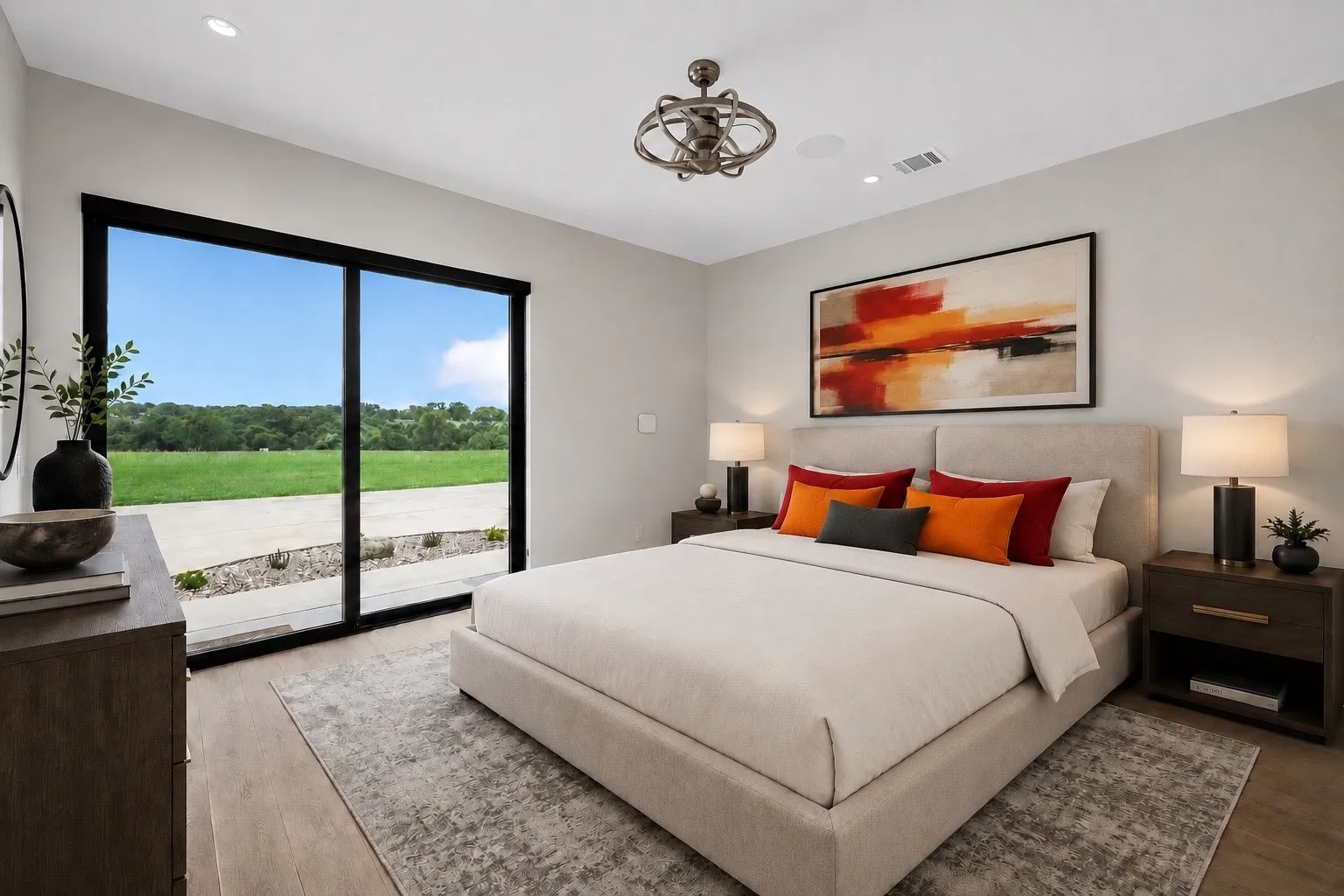 This picture has been virtually staged. Bedroom with wood-finish flooring, a contemporary ceiling fan, and recessed lighting