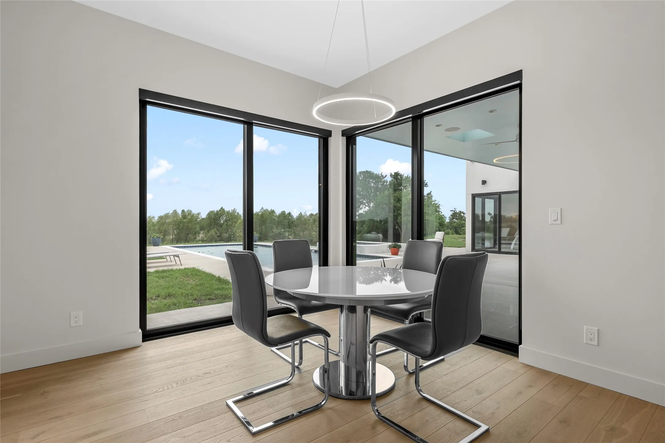 Expansive floor-to-ceiling windows featuring black framing