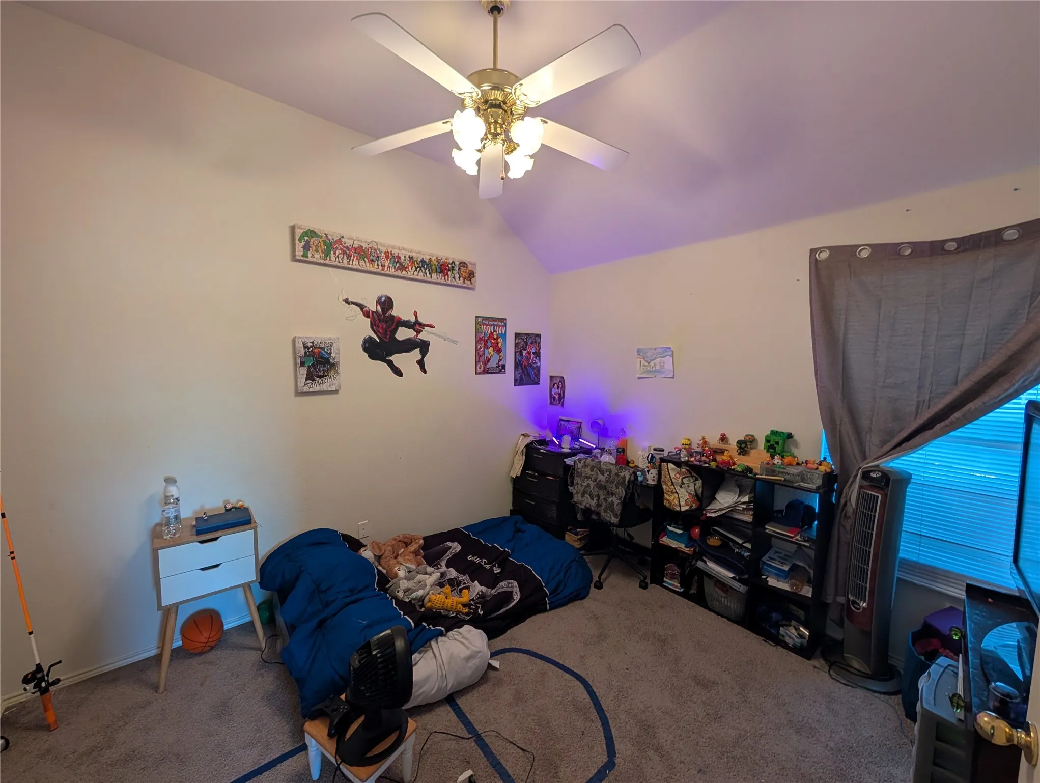 Vaulted ceiling with an overhead ceiling fan
