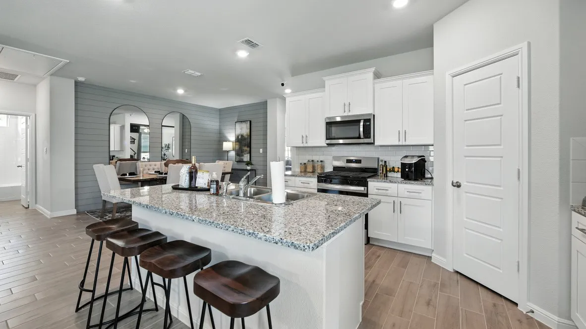 Kitchen - All Home and community information, including pricing, included features, terms, availability and amenities, are subject to change at any time without notice or obligation. All Drawings, pictures, photographs, video, square footages, floor plans, elevations, features, colors and sizes are approximate for illustration purposes only and will vary from the homes as built.
