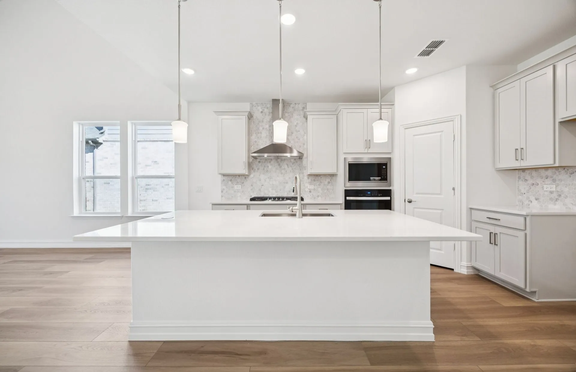 *Floorplan representation, not actual home - Large island overlooking gathering room and dining areas