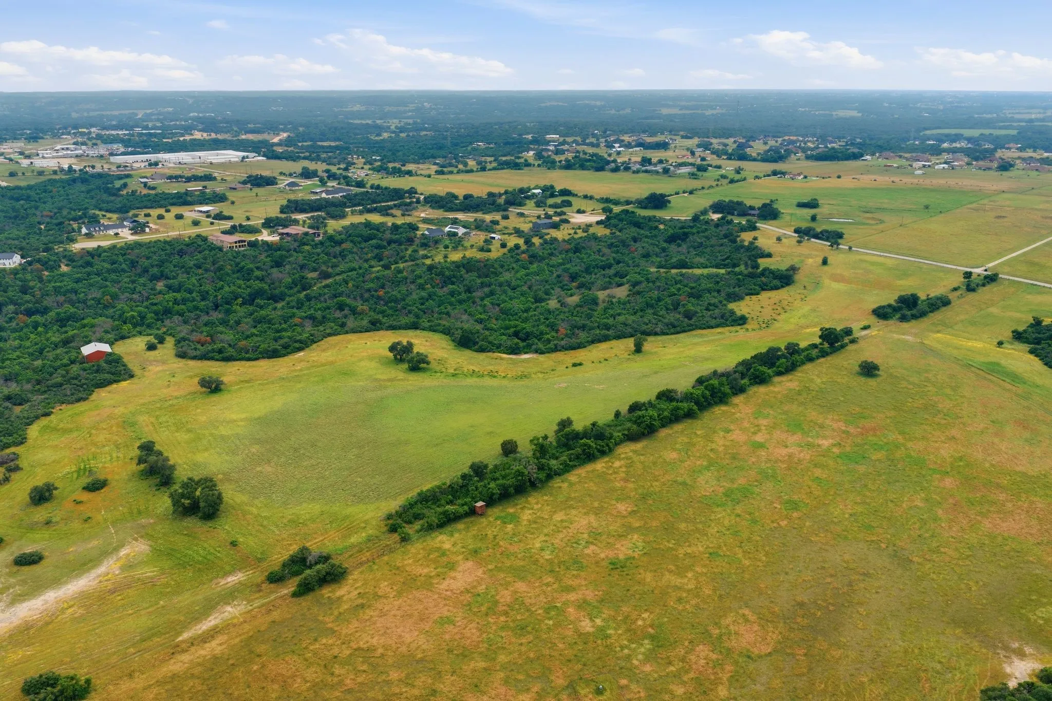 Serene and secluded, this stunning acreage offers a rare opportunity to enjoy country living surrounded by nature and expansive views.