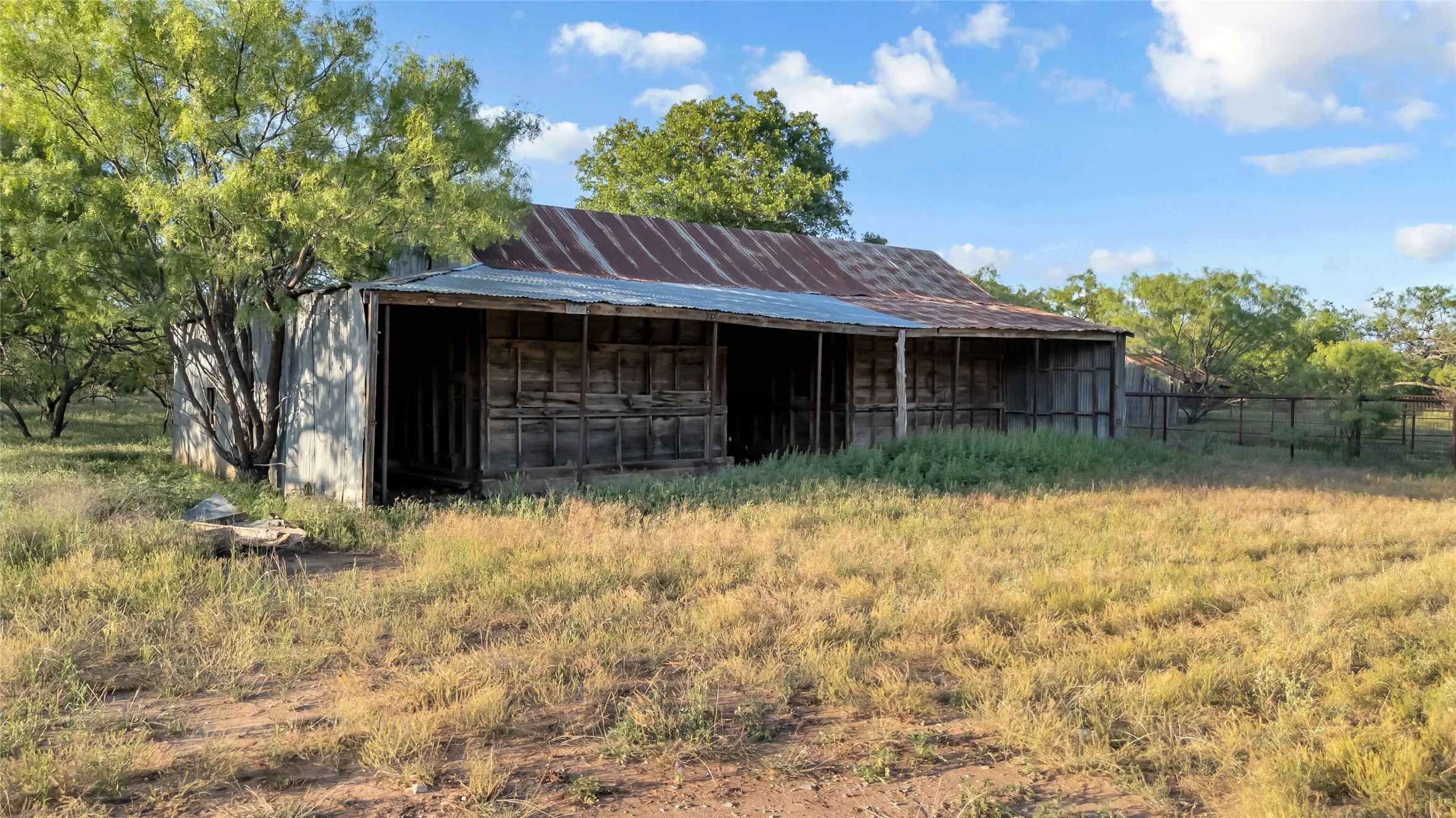 Barn next to cattle pens